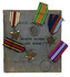 A British pilot’s logbook, detailing his service in Egypt and Jordan during World War II, together with 5 WWII medals