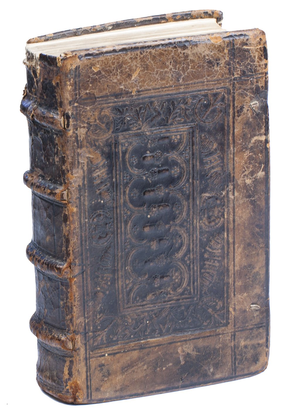 EUSEBIUS. - L[']histoire ecclesiastique ..., translatee de Latin en Fra[n]coys, par Messire Claude de Seyssel, Evesque lors de Marseille, & depuis Archevesque de Thurin.Antwerp, Maarten de Keyser, 1533 (colophon: 17 April). 8vo. With a woodcut border on the title-page, assembled from 4 blocks (that at the foot with De Keyser's printer's device), about 10 woodcut decorated initials plus about 10 repeats (2 gothic series and 2 roman series). Set in three sizes of bastarda type with textura initials. Contemporary Flemish blind panel-stamped calf, each board with the same panel and double and single fillets, a triple fillet in the panel stamp separating the inner and outer panel. The inner is an acorn cresting panel with 4 1/2 acorns on each side and the flowers not attached to the acorns, remnants of leather ties.