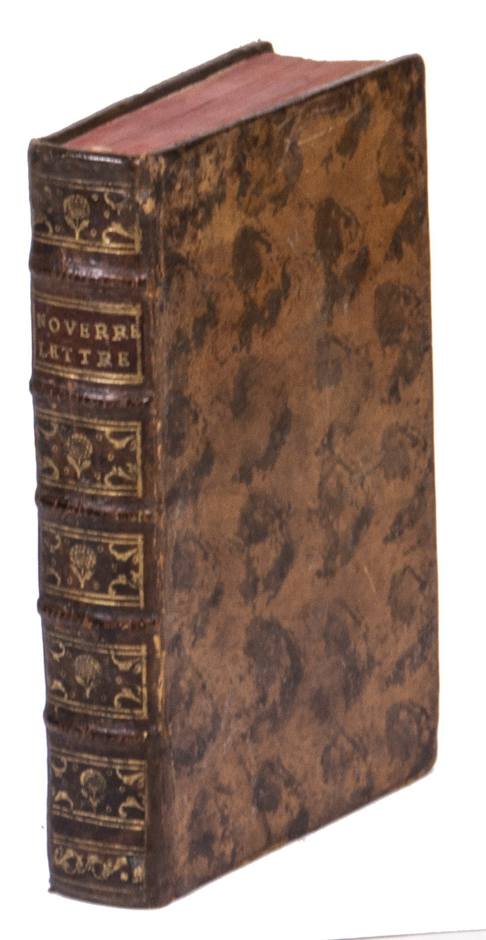 NOVERRE, Jean Georges. - Lettres sur la danse, et sur les ballets.Stuttgart (and sold in Lyon), Aim Delaroche, 1760. Small 8vo. With a small vignette built up from typographical ornaments on the title page, an engraved armorial headpiece at the start of the dedication, an decorated initial and a headpiece both built up from typographical ornaments, and some woodcut tailpieces. Contemporary marbled calf.
