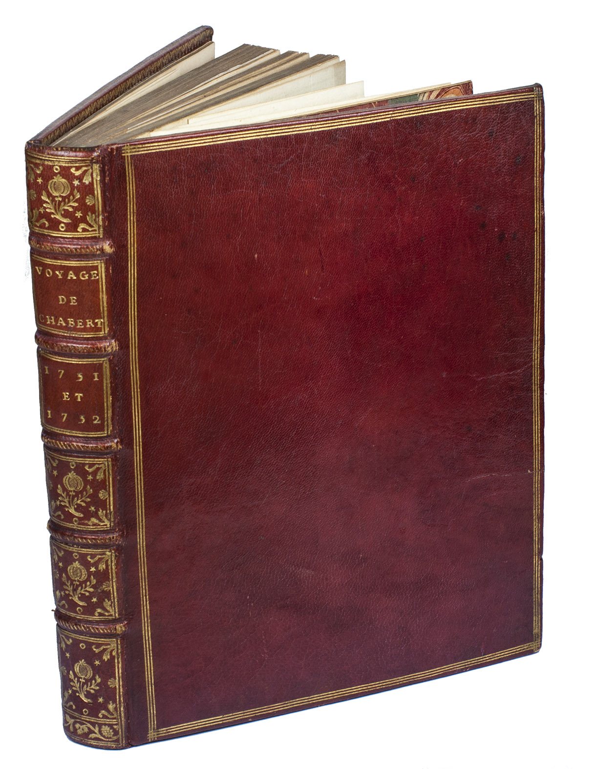 CHABERT, Joseph Bernard. - Voyage fait par ordre du Roi en 1750 et 1751, dans l'Amrique septentrionale, pour rectifier les cartes des ctes de l'Acadie, de l'Isle Royale & de l'Isle de Terre-Neuve; et pour en fixer les principaux points par des observations astronomiques.Paris, Imprimerie Royale, 1753. 4to. With an engraved printer's vignette on the title-page, an engraved headpiece at the beginning of the first chapter, 6 folding engraved maps, a folding engraved plate showing geometrical figures, and a large folding table with calculations for the position of the sun and the moon. Contemporary gold-tooled red morocco.