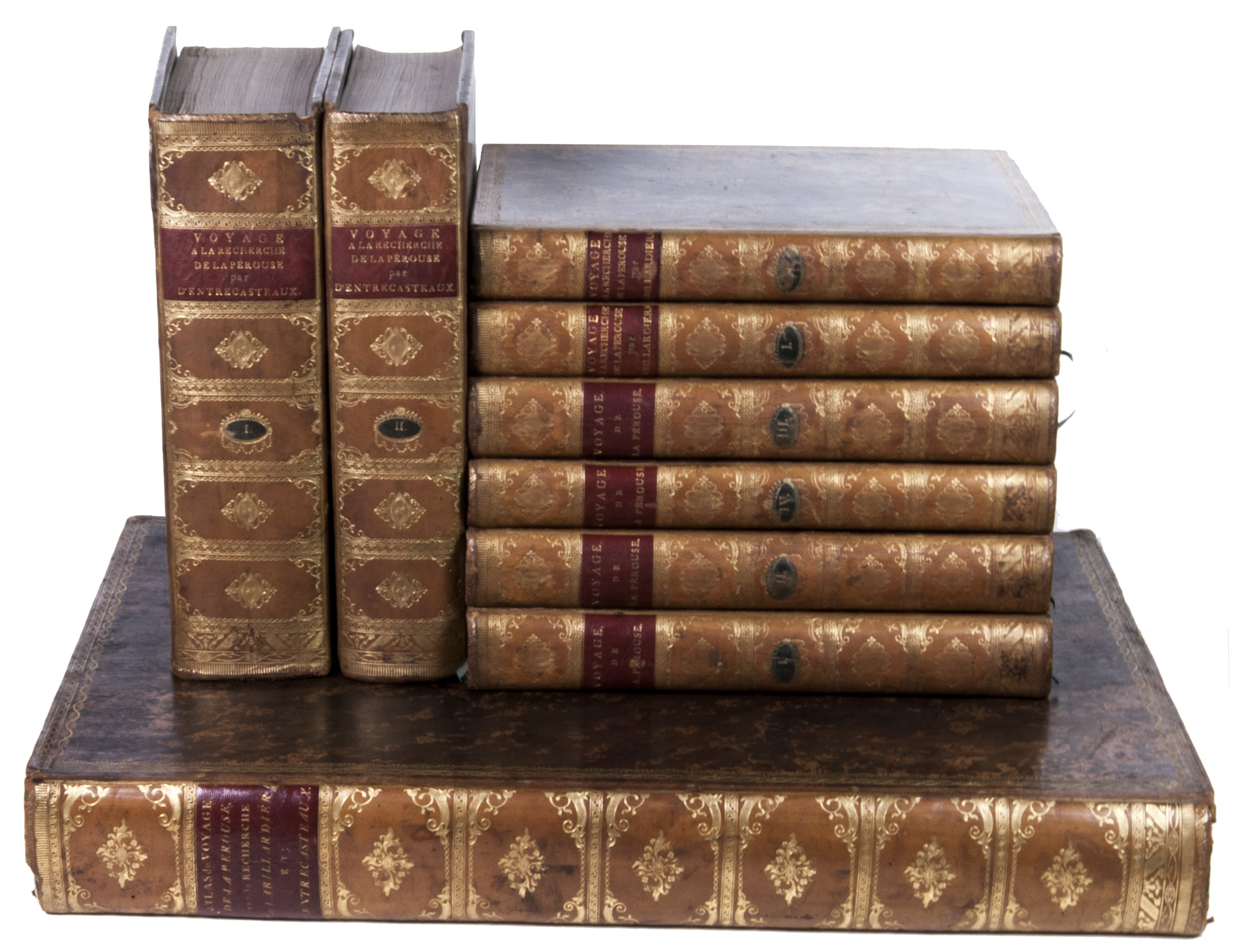 PÉROUSE, Jean Francois de Galaup de la. - Voyage autour du monde.Paris, Imprimerie de la République, An V (= 1797). 9 volumes: ad 1 in 4 volumes; ad 2 in 2 volumes; ad 3 in 2 volumes, with the atlases of the 3 works bound together in 1 volume. 4to (30 x ca. 23 cm.) and large folio (ca. 57 x 40 cm.). Ad 1: with an engraved portrait of De la Pérouse by Tardieu and tables in the text. The atlas contains an engraved title-page, 1 large double-page folding map of De la Pérouse's journey, 20 double-page maps, and 48 full-page maps, views, and illustrations. Ad 2: with tables in the text. The atlas contains an engraved title-page, 1 double-page map, and 43 full-page plates. Ad 3: with 33 folding engraved plates and with tables in the text. The atlas contains an engraved title-page, an engraved table of contents, 37 large double-page folding maps, 2 large double-page folding views, and 10 full-page maps and illustrations. The three atlases for ads 1-3 are bound together in a large folio matching contemporary gold-tooled marbled calf binding. With:(2) LABILLARDIÉRE, Jacques Julien Houton de. Voyage à la recherche de Lapérouse.Paris, H.J. Jansen, An VIII (= 1799-1800).(3) ENTRECASTEAUX, Antoine Raymond Joseph de Bruni, chevalier d'. Voyage envoyé à la recherche de Lapérouse.Paris, Imprimerie Impériale, 1808.Contemporary uniform gold-tooled marbled calf, richly gold-tooled spines with a red title-label and a small green volume number label, both lettered in gold, gold-tooled board edges, marbled endpapers.