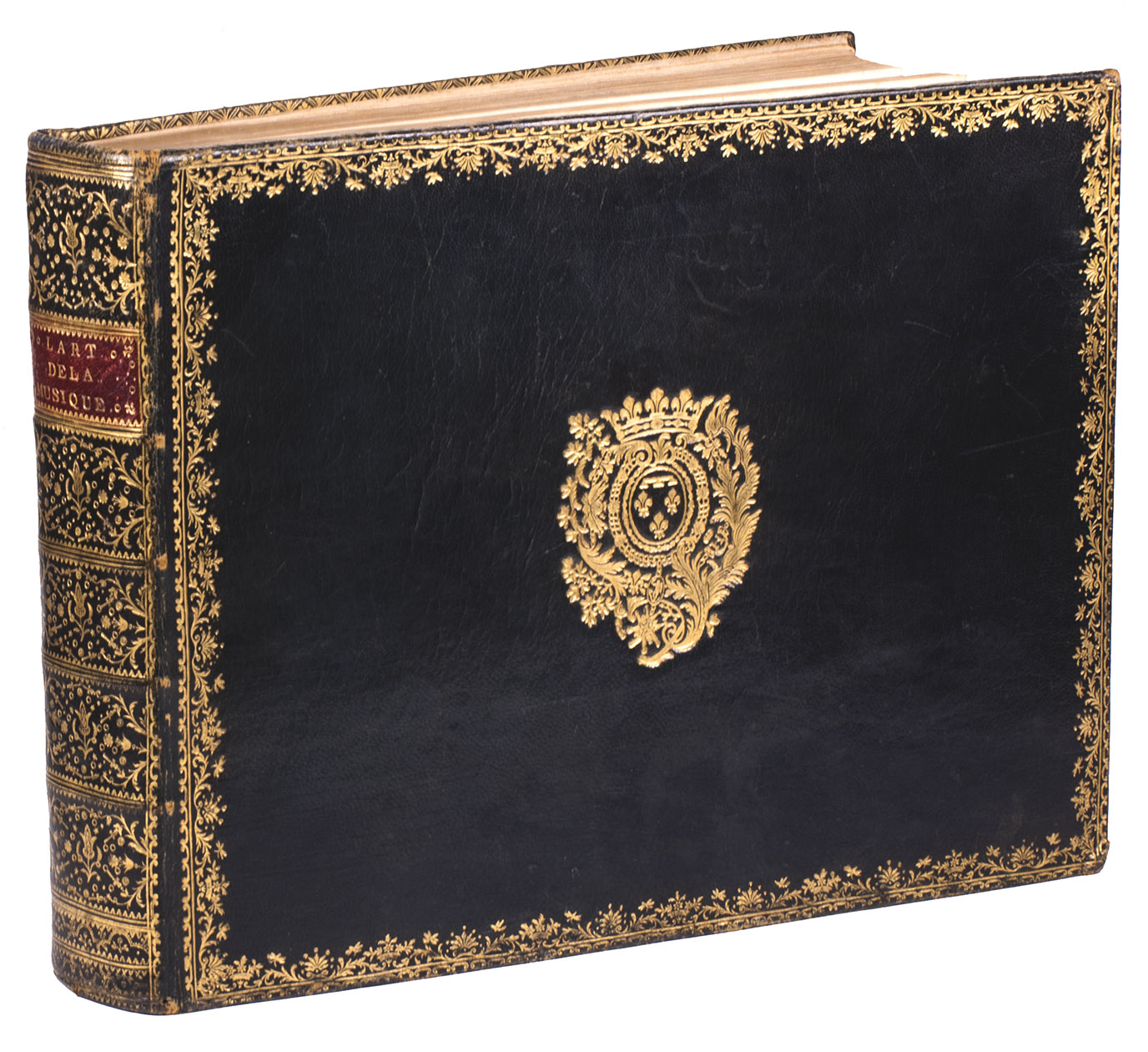 [DUMAS, Antoine-Joseph]. - L'art de la musique enseign et pratiqu par la nouvelle methode du bureau typographique.Paris, Sr. Auguste [for the author], [1753]. Large oblong 4to (26 x 33.5 cm). Wholly engraved, including an engraved title-page, two-page engraved dedication, a double-page folding engraved musical table (