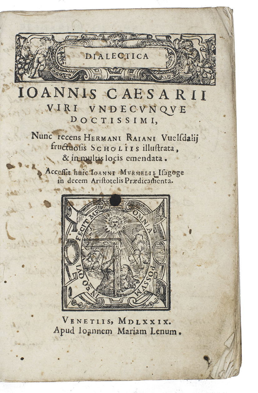CAESARIUS, Johannes. - Dialectica ... nunc recens Hermani Raiani Welsdalii fructuosis scholiis illustrata, & in multis locis emendata. Accessit huic Ioanni Murmelii Isagoge in decem Aristotelis Praedicamentas.Venice, Giovanni Maria Leni, 1579. 8vo. With Lenis woodcut device on the title-page (a figure holding a set square up to the sun, in a scrollwork cartouche with motto, In eo qui fecit me omnia possum) which has the letterpress title Dialectica in a woodcut factotum with scrollwork and putti at the head, and woodcut decorated initials. Set in roman and italic type with occasional Greek. Contemporary vellum.