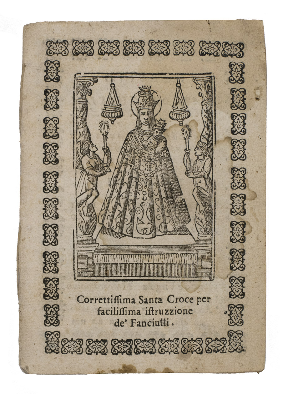 [ABC BOOK]. - Correttissima Santa Croce per facilissima istruzzione de' fanciulli.[Rome], Francesco Ansillioni, [ca. 1750]. Small 8vo. With 2 nearly full-page woodcuts (the Holy Virgin on the front cover and a monk with a shining nimbus containing the word charitas around his head on the back cover) and 7 small religious woodcuts in text. Front and back cover and the first two pages with alphabets and numbers in ornamental woodcut borders. Sewn.