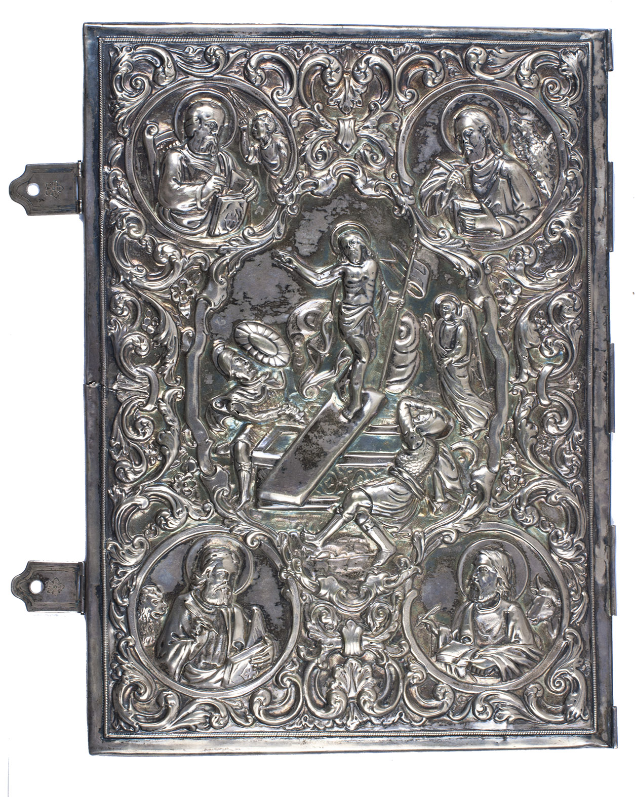 [BINDING - SILVER]. - [Pair of embossed silver book covers, with two engraved silver clasps].[Netherlands?, ca. 1725?]. Pair of embossed silver book covers (34 x 25 x 3 cm); each cover with a large scrollwork cartouche surrounded by extensive vine and flower decorations and with medallion portraits in each of the four corners, the front showing the crucifixion flanked by Mary and St. John (with an 