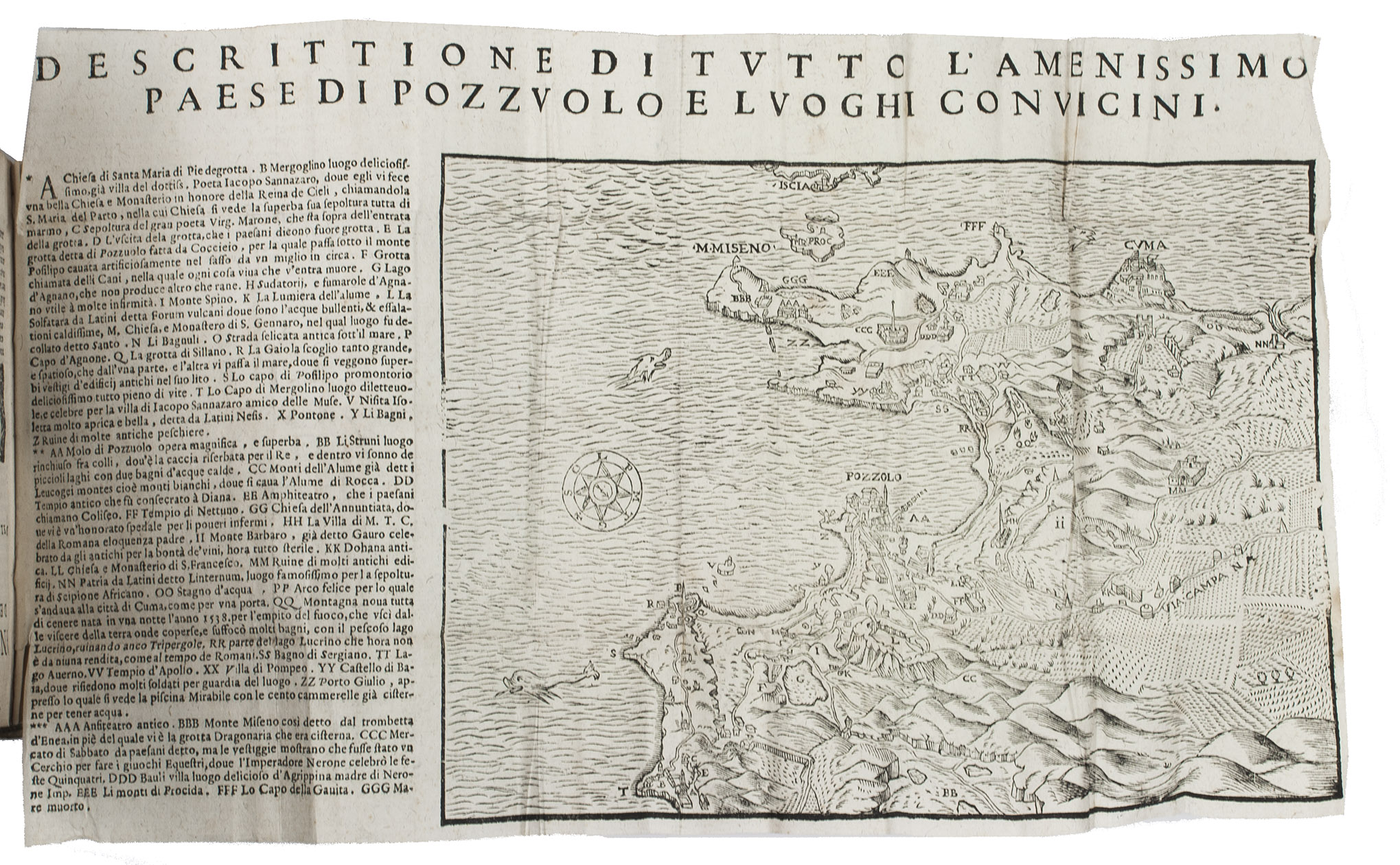 MAZZELLA, Scipione. - Sito, et antichita della citta di Pozzuolo, e del suo amenissimo distretto Naples, Tarquinio Longo for Giorgio Varisco (part 1) and Bartholomeo Carampello (part 2), 1606. 2 parts in 1 volume. Small 8vo (15 x 10 cm). With 3 title-pages, a large folding woodcut map with letterpress title and text (the woodcut itself 17 x 24.5 cm) showing Pozzolo and the surrounding area (omitted in some copies), 15 woodcut illustrations (plus 4 repeats) in text. 17th-century limp sheepskin parchment.