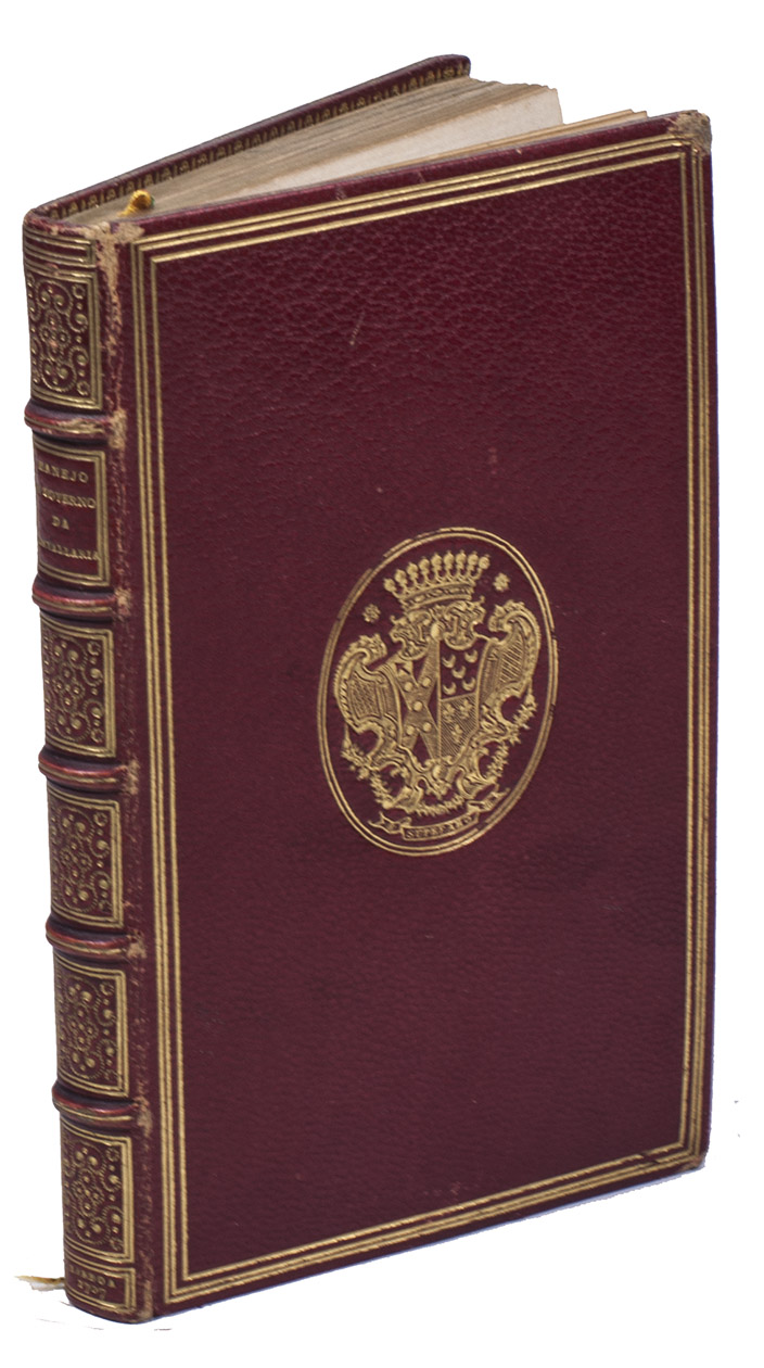 GUALDO PRIORATO, Galeazzo. - Manejo, e Governo da Cavallaria.Lisbon, Miguel Manescal, 1707. Small 8vo (14.5 x 9 x 1.5 cm). With a richly engraved frontispiece showing a cavalry battle before a castle, with one cavalryman on his rearing horse in the foreground, and the title in an elaborate cartouche incorporating military attributes. Gold-tooled red goatskin morocco (ca. 1892/99) by Marcellin II Lortic in Paris (signed M LORTIC in the tooled foot of the front turn-in), each board with the crowned arms of Jos Pinto Leite in a double oval and a triple-filet rectangular frame, richly gold-tooled spine and turn-ins, marbled endpapers, gilt edges, headbands, silk ribbon marker.