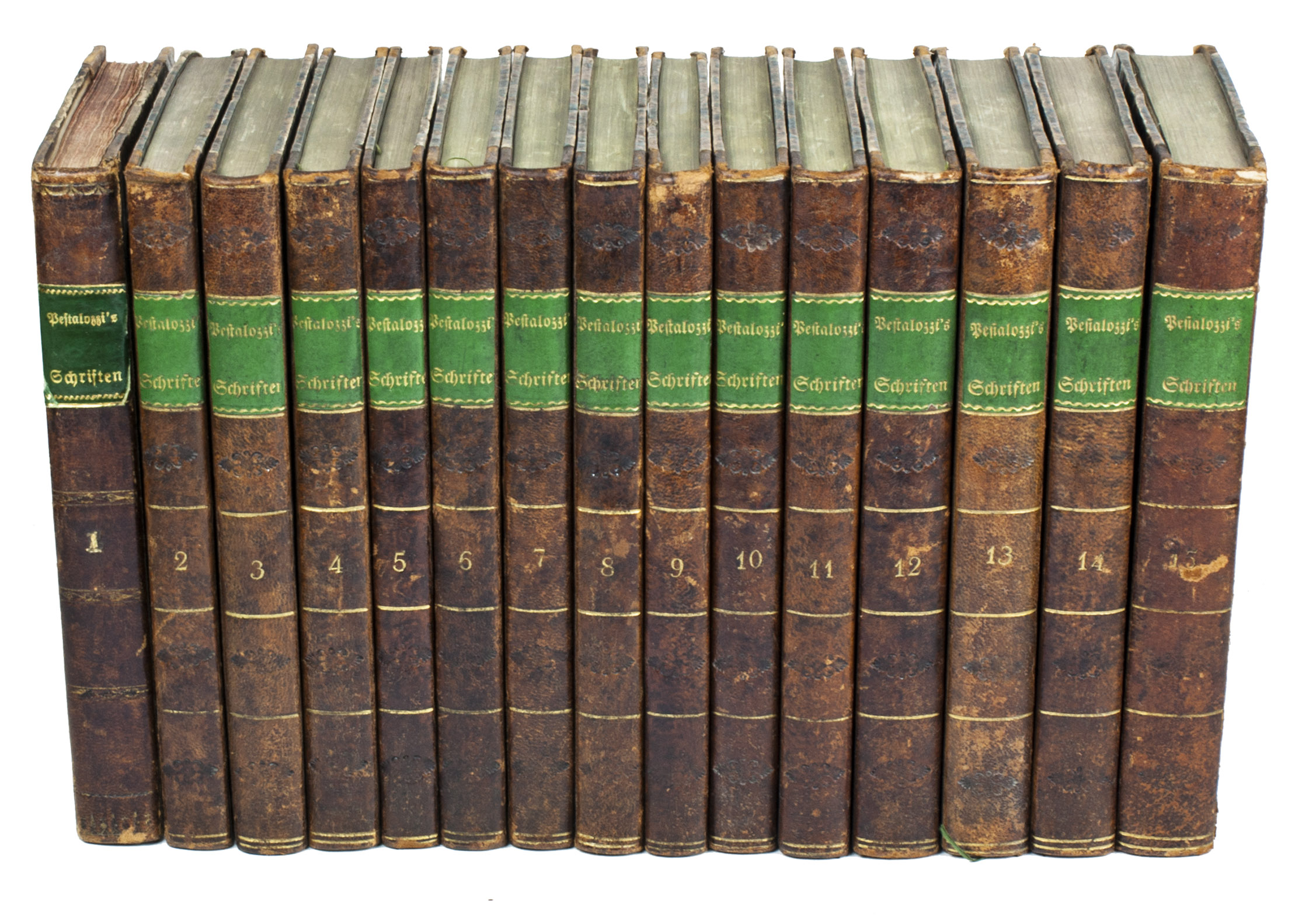 PESTALOZZI, Johann Heinrich. - Smmtliche Schriften. Stuttgart, Tbingen, J.G. Cotta'schen Buchhandlung, 1819-1826. 15 volumes. 8vo. With folding leaf of music in the first volume and mathematical figures on 5 folding engraved plates in volume 15. Contemporary half calf, gold-tooled spine.