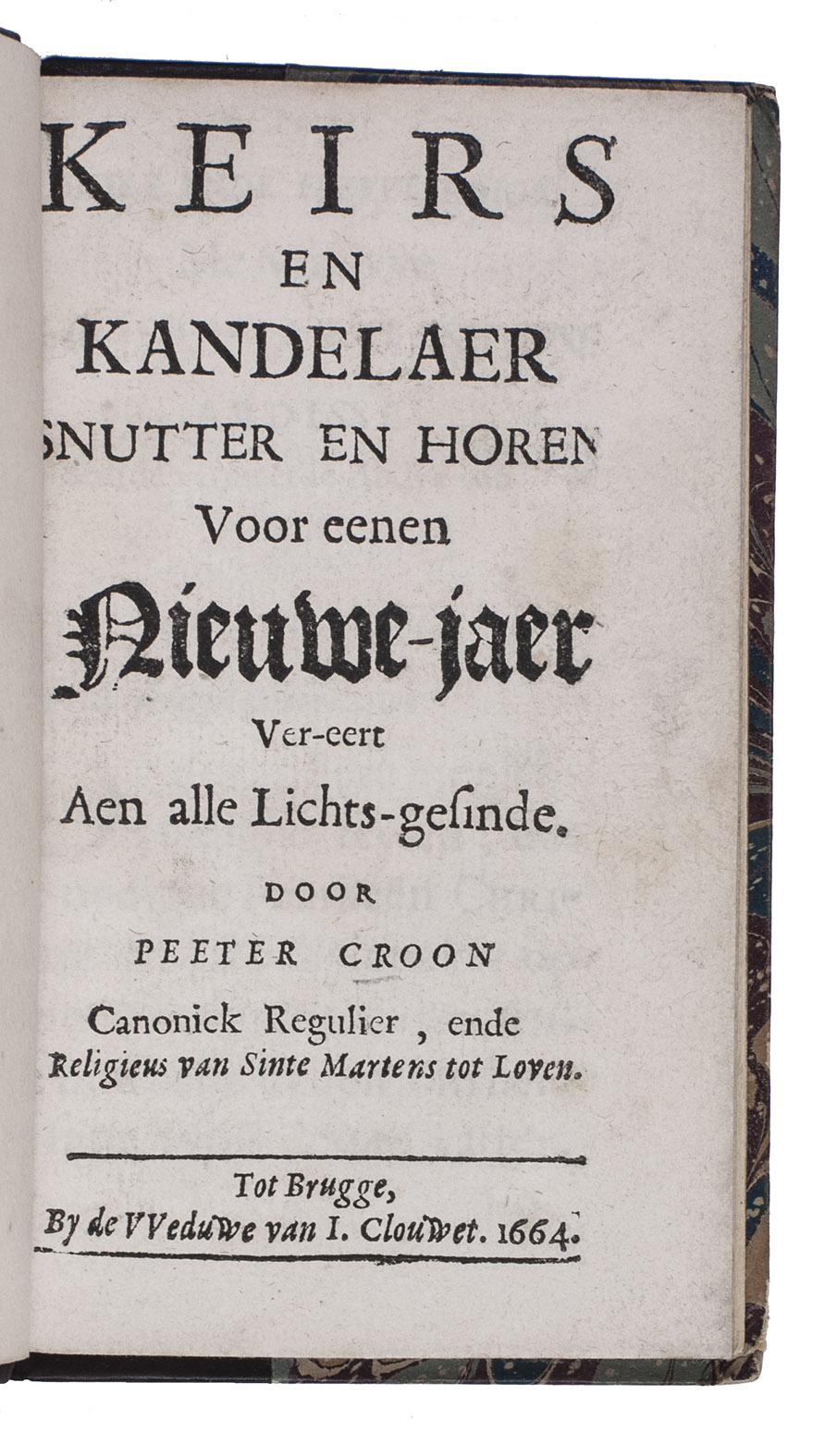 CROON, Petrus. - Keirs en kandelaer snutter en horen voor eenen nieuwe-jaer ver-eert aen alle lichts-gesinde.Bruges, widow of Joannes Clouwet, 1664. 12mo. With (letterpress?) diamond-head music notes. 19th-century gold-tooled half calf, marbled paper sides, with the title lettered in gold on the spine, marbled endpapers.