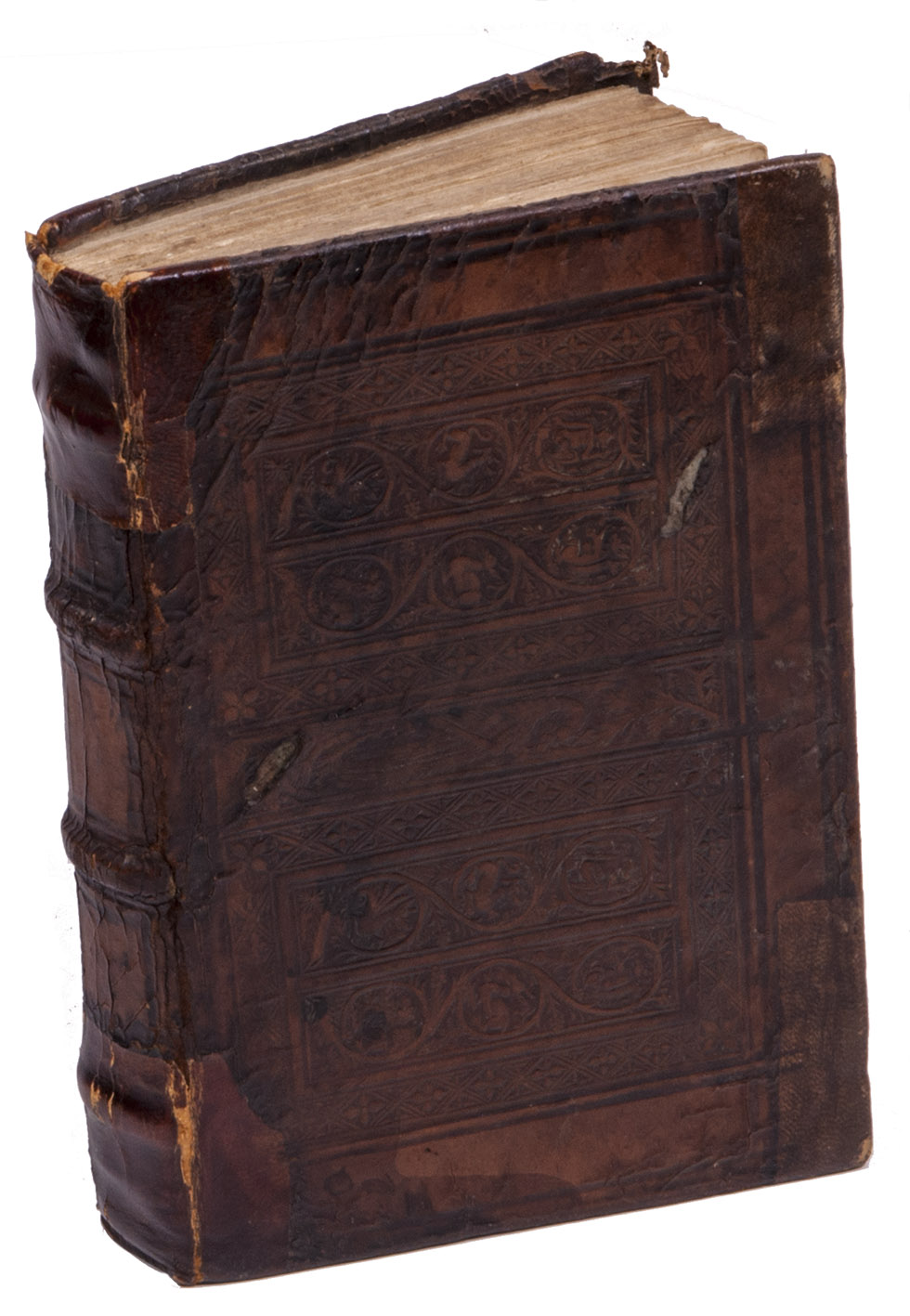 [FIOCCO, Andrea Domenico] under the name of Lucius FENESTELLA. - De magistratibus, sacerdotiisq[ue] Romanorum libellus, iam primum nitori restitutus. Pomponii Laeti itidem de magistratibus & sacerdotiis, & praeterea de diversis legibus Rom[anorum]. Item Valerii Probi grammatici de literis antiquis opusculum.Including: POMPONIO LETO, Giulio. De Ro[manorum]. magistratibus, ...Basel, (colophon: Valentino Curio, May 1523). With the general title in a woodcut border, Curio's large architectural woodcut device on the otherwise blank final page.With:(2) LUCIANUS OF SAMOSATA. Complures ... dialogi  Desiderio Erasmo Roterodamo ... in Latinum conversi, &  Nicolao Buscoducensi illustrati, additis Fabularum & difficilium vocabulorum explanationibus.(Colophon: Antwerp, Michael Hillen van Hoochstraten, 1524).(3) MOSELLANUS, Petrus (Peter SCHADE). Paedologia ..., in puerorum usum conscripta & aucta. Dialogi XXXVII. Dialogi pueriles Christophori Hegendorphini. XII. ...Including: HEGENDORF, Christoph. Dialogi pueriles ... XII. ...(Colophon: Antwerp, Michael Hillen van Hoochstraten, 1523). 3 editions in 1 volume. 8vo (16 x 10.5 cm). Contemporary panel-stamped calf, each board with the same 3 panel stamps: 2 virtually identical panels with 6 animals in 2 grape vines (the animals from head to foot in the left vine: a monkey, dog and wyvern; and in the right vine: a squirrel, hare and lion) in a border of a diaper of quatrefoils in lozenges, the two separated by a small panel stamp sith a peacock, paste-downs made from a leaf from an Aristotle manuscript on vellum.