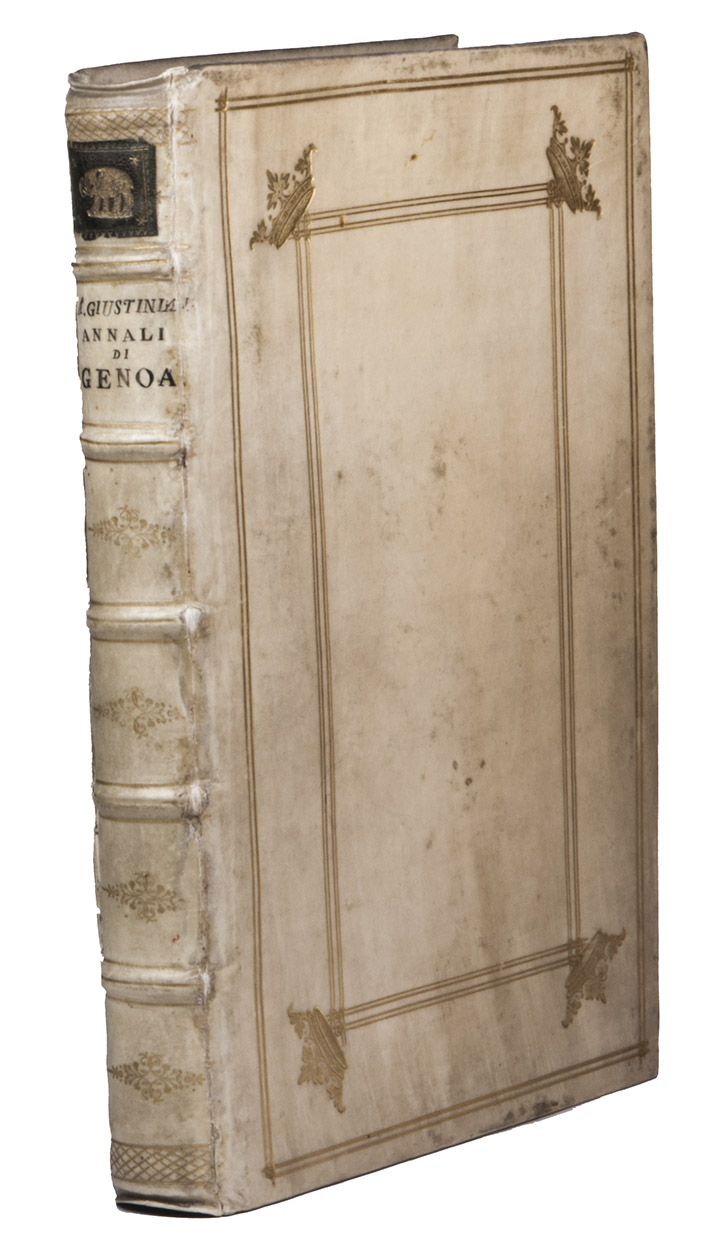 GIUSTINIANI, Agostino de. - Castigatissimi annali con la loro copiosa tavola della  eccelsa et illustrissima Republica di Genoa, da fideli  et approvati scritti accuratamente racolti.Genoa, Antonio Bellone, 1537. Folio. Title-page in red and black with a woodcut device incorporating the coat of arms of Genoa supported by angels (the cross in the arms also printed in red), a large woodcut showing Saint George slaying the dragon on the back of the title-page; beautiful woodcut decorated initials (some pictorial) in the text (at least 5 series). Set in roman type, with the privilege line on the title-page in a larger rotunda gothic, and with 5 different vine-leaf ornaments. Gold-tooled strong ivory vellum (ca. 1674/89? ), bound by Albert Magnus for the Dutch book collector Paulo van Uchelen, sewn on 5 supports, each board gold-tooled with an outer frame of double fillets with very small, square cornerpieces, an inner frame of 2 double fillets with small cornerpieces within the 2 double fillets and a crown in each of the four corners of the inner frame. The gold-tooled spine contains a black label with a gold-tooled elephant at the head and just below a manuscript title. Red and brown sprinkled edges.