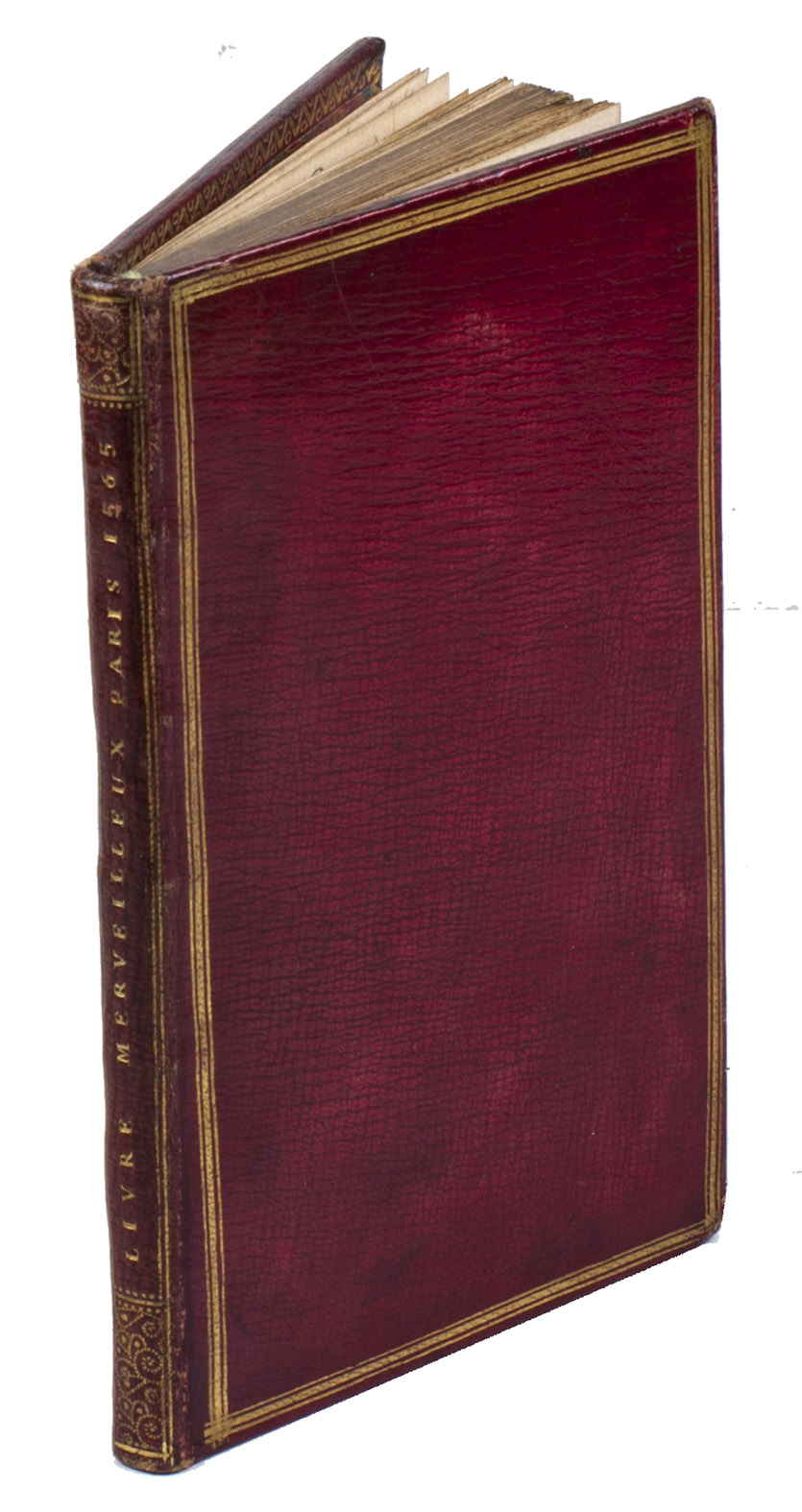 [TELESFORO DA COSENZA]. - Livre merveilleux, contenant en bref la fleur et substance de plusieurs traittez, tant des propheties & revelations, qu'anciennes croniques, faisant mention de tous les faictz de l'Eglise Universelle, co[m]me des scismes, discords & tribulations advenir en l'Eglise de Rome, & d'un temps auquel on ostera & tollira aux ge[n]s d'eglise & clerg, ... Paris, Thibault Bessault, 1565. 8vo. With Bessault's woodcut device on the title-page. 18th-century French grained red morocco (ca. 1745?), gold-tooled spine with pointill ornaments, each board framed with thin-thick-thin fillets with a rosette(?) stamped over their intersections at the corners, gold-tooled turn-ins, gold fillets on the board edges, gilt edges.