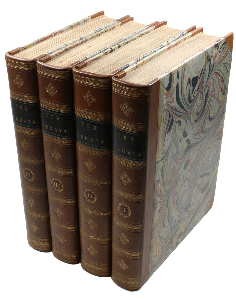 [MARGHINANI, `Ali ibn Abi Bakr] (Charles HAMILTON, transl.). - The Hedya, or Guide; a commentary on the Mussulman laws: translated by the order of the Governor-General and Council of Bengal.London, Thomas Bensley, 1791. 4 volumes. Small folio (22 x 27.5 cm). Modern half calf in period style, marbled sides, gold-tooled smooth spine divided into six fields by rolls, black morocco spine label in the second field, the others with an arabesque ornament.