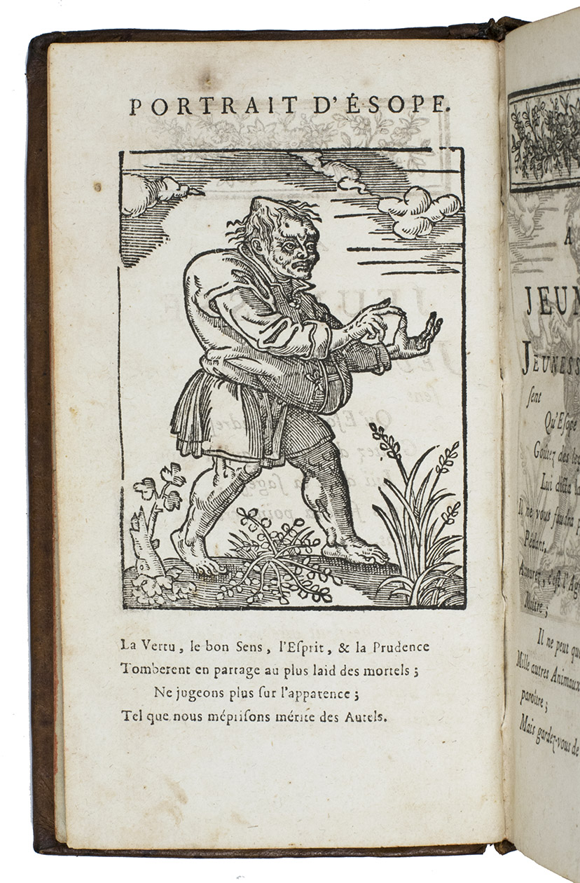 AESOP. - Les Fables dEsope, mises en Franois, Avec le Sens moral en quatre Vers, & des Figures  chaque Fable. Nouvelle dition revue, corrige & augmente de la Vie dEsope, avec Figures, & les Quatrains de Benserade, ddie  la Jeunesse.Rouen, chez A. Delalain, An XII [1804]. 12mo. With a full-page woodcut portrait (97 x 72 mm.) of Aesop., and 192 woodcuts of ca 56 x 72 mm., illustrating the Vie dsope (28) and 164 out of a total of 225 Fables; woodcut head- and tailpieces. Mottled calf over boards..