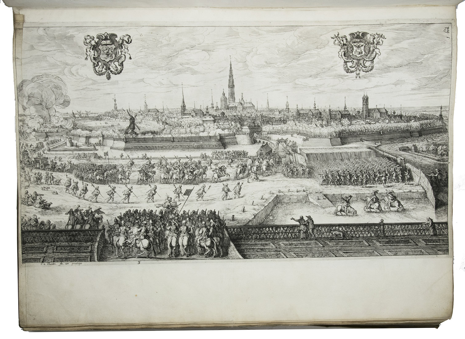 GEVAERTS, Jean Gaspard (Caspar GEVARTIUS) and Pieter Paul RUBENS. - Pompa introitus honori serenissimi principis Ferdinandi Austriaci Hispaniarum Infantis S.R.E. Card. Belgarum et Burgundionum Gubernatoris etc. a S.P.Q. Antwerp. Decreta et adornata. ...Antwerp, Theodoor van Tulden (colophon: printed by Jan van Meurs, 1641), [published January 1643].  Royal 1mo (full-sheet leaves) (57 x 42 cm). With a letterpress half-title and XXXIX single-page, double-page and larger folding plates (numbered I-XXXIX in the table of plates, printed and assembled from 43 copper plates numbered [1]-[2], 3-43) depicting the rich allegorical and ornamental triumphal arches and festive decorations, paintings, statues, etc., all designed by Pieter Paul Rubens, all but one for the triumphal entry of the Spanish cardinal-infante Ferdinand into Antwerp in 1635. Further with 46 smaller engravings in the text, depicting coins and medals, and numerous woodcut decorated initials (4 series). Contemporary overlapping vellum, manuscript title on spine.