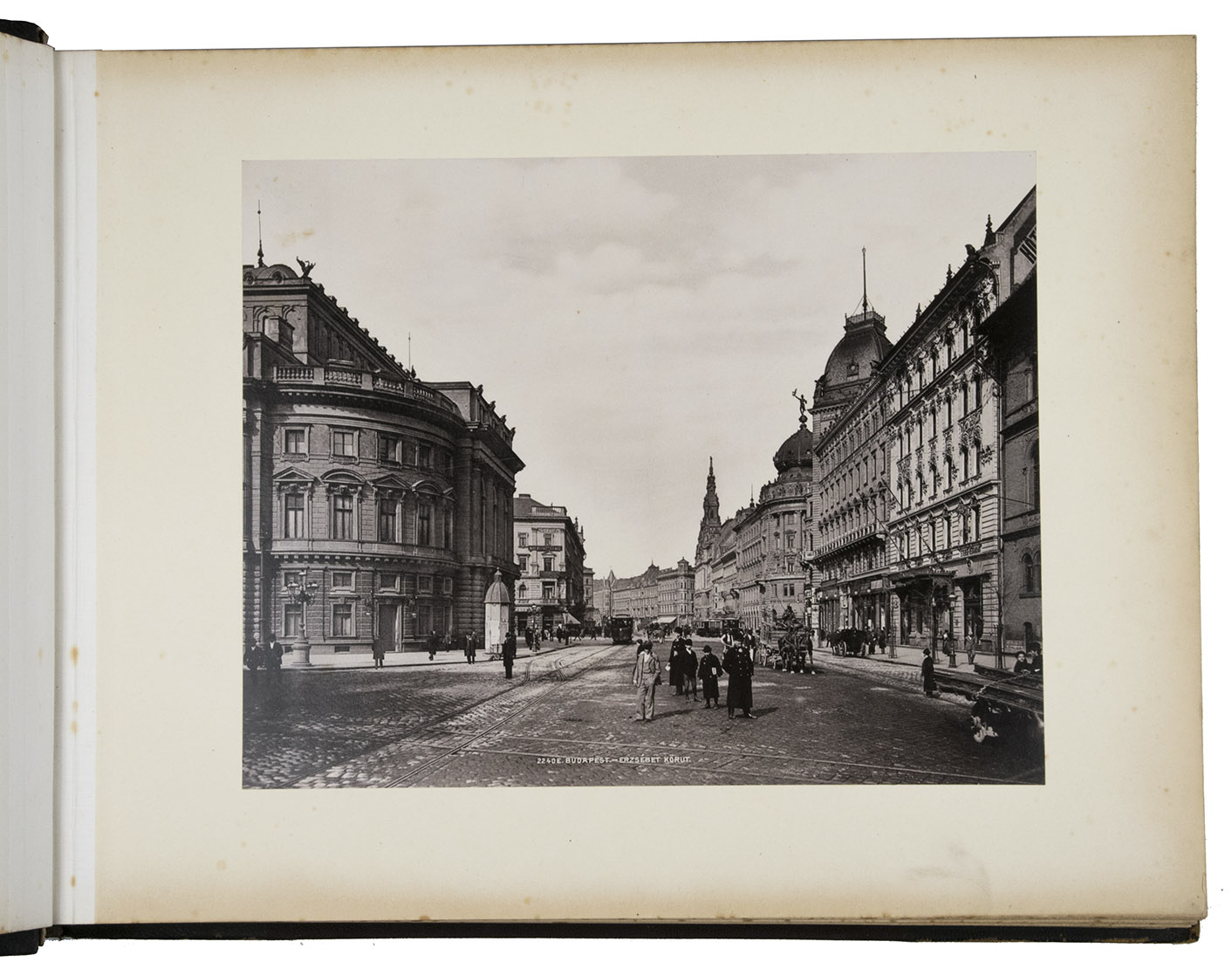 [AUSTRIA-HUNGARY - GERMANY]. - [Photographs of Budapest, Vienna and other cities].Budapest, Dresden, Innsbruck, Mnchen, Calderoni s trsa, Verlag von Stengel & Co, Fritz Gratl, 1897/1899. Oblong album (32 x 41 cm). Album with 43 photographic prints of various sizes (22 x 16.5 to 30 x 24 cm ), pasted on thick paperboard. Half black leather, red buckram sides, gold-stamped spine with the date 