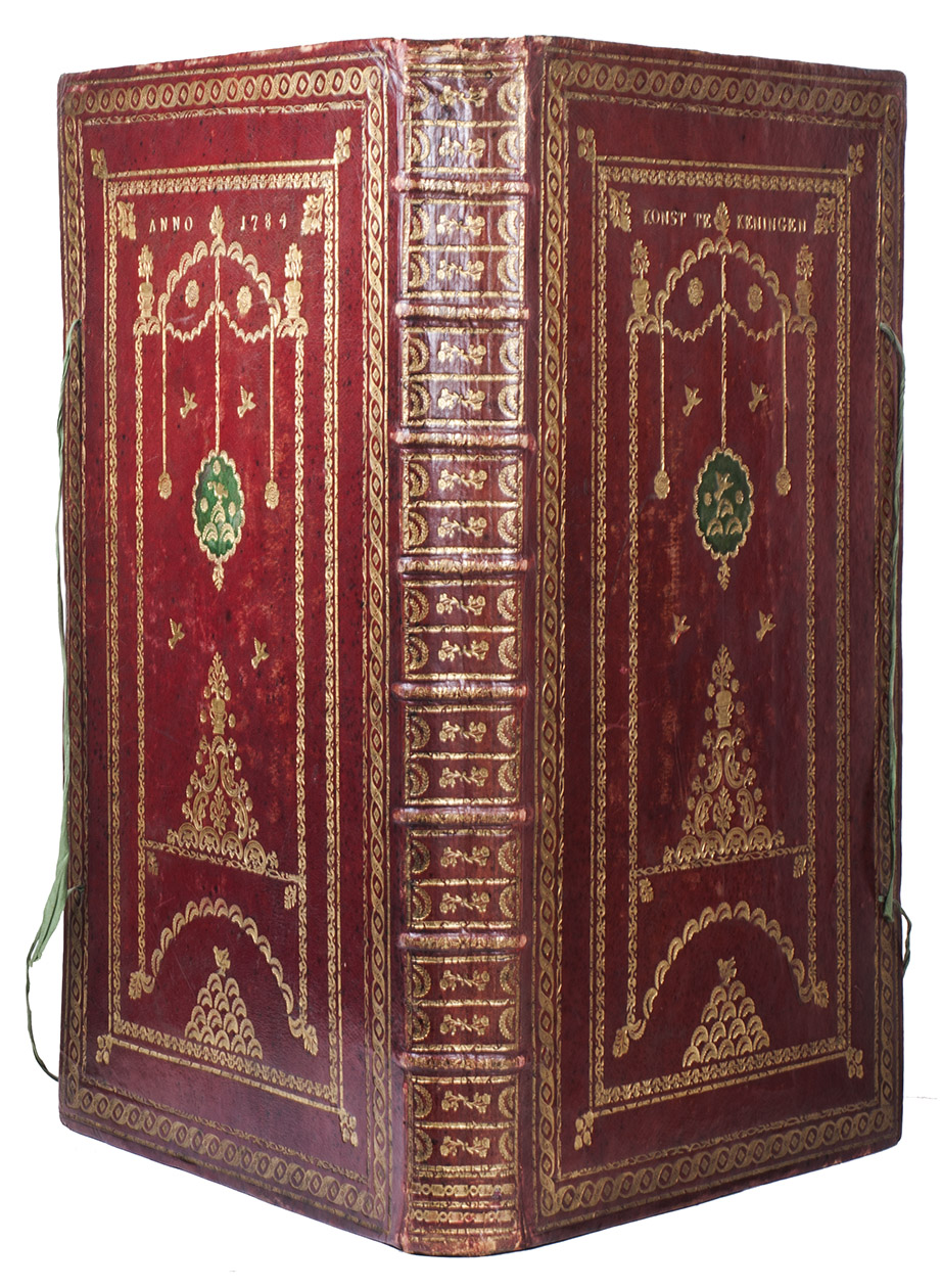 [DRAWINGS - BIRDS]. - Konst tekeningen. [Detailed illustrations of birds].[The Netherlands], binding dated 1784. Large folio (52 x 33.5 cm). With 18 large, beautifully hand-drawn and coloured illustrations of birds.Contemporary richly gold-tooled red morocco over boards, sewn on 8 supports, each board with a round, gold-tooled, green morocco inlaid centre piece, gold-tooled board edges, 2 pairs of green cloth ties, gilt edges, and block-printed paste-paper endpapers in red and yellow. The spine is also richly gold-tooled with 2 different rolls to frame the compartments and underline the leaf and flower stamps. The front and back boards match, except for the gold lettering: on the front board 