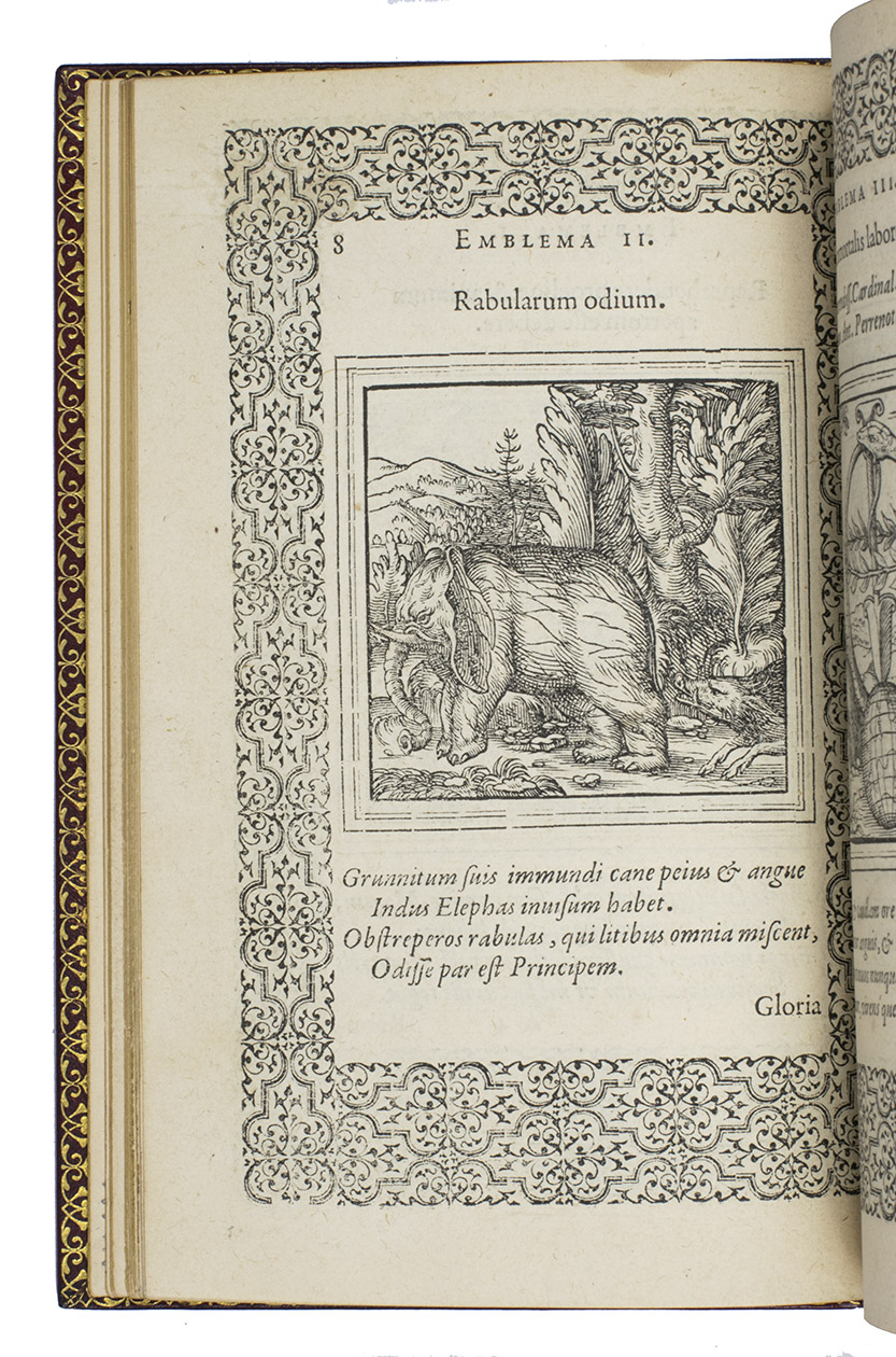JUNIUS, Hadrianus. - [title-page *1:] Eiusdem Aenigmatum libellus, ad ... Arnoldum Rosenbergum jurisconsultum. [title-page A1:] Emblemata, ad D. Arnoldum Cobeliu. Eiusdem Aenigmatum libellus, ad ... Arnoldum Rosenbergum.Antwerp, Christoffel Plantin, 1565 (colophon: 15 May 1565). 2 works in 1 volume. Small 8vo (17 x 11.5 cm). With 57 woodcut emblems, mainly by Gerard Janssen van Kampen with a few by Arnold Nicolai, all after Geoffroy Ballain and Pierre Huys. Red goatskin morocco (ca. 1850/60?) by Charles-Franois Cap in Paris, signed CAPɔ in the foot of the front turn-in.