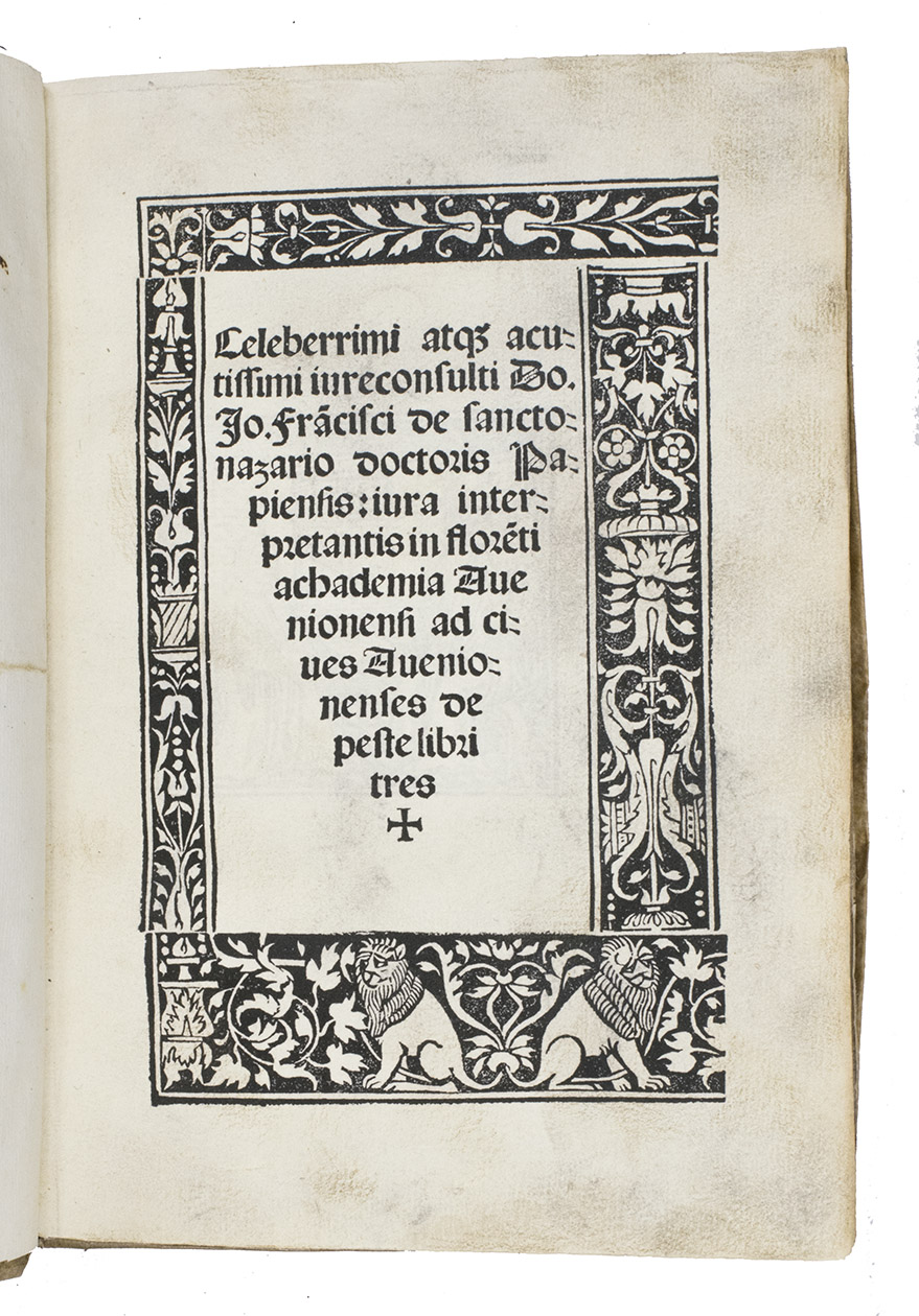 RIVA DI SAN NAZARRO, Gianfrancesco. - Iura interpretantis in flore[n]ti achademia Avenionensi ad cives Avenionenses de peste libri tres.[Colophon:] Avignon, Jean de Channey, 12 September 1522. 4to. With the title in a 4-piece woodcut border (white on black); a woodcut illustration of the author presenting a book to the dedicatee on the verso of the title-page; the dedication on A2v in a 4-piece woodcut border and the coat-of-arms of the dedicatee Franois Guillaume de Castelnau de Clermont-Lodve (1480-1540), who was a cardinal in Avignon; the opening of the preface(?) on D3v with a woodcut border (the same as A2v) and the coat-of-arms of the city of Avignon; the woodcut device of Jean de Channey on page x2v, similar to Aldus's device: an anchor with a dolphin and the printer's name (