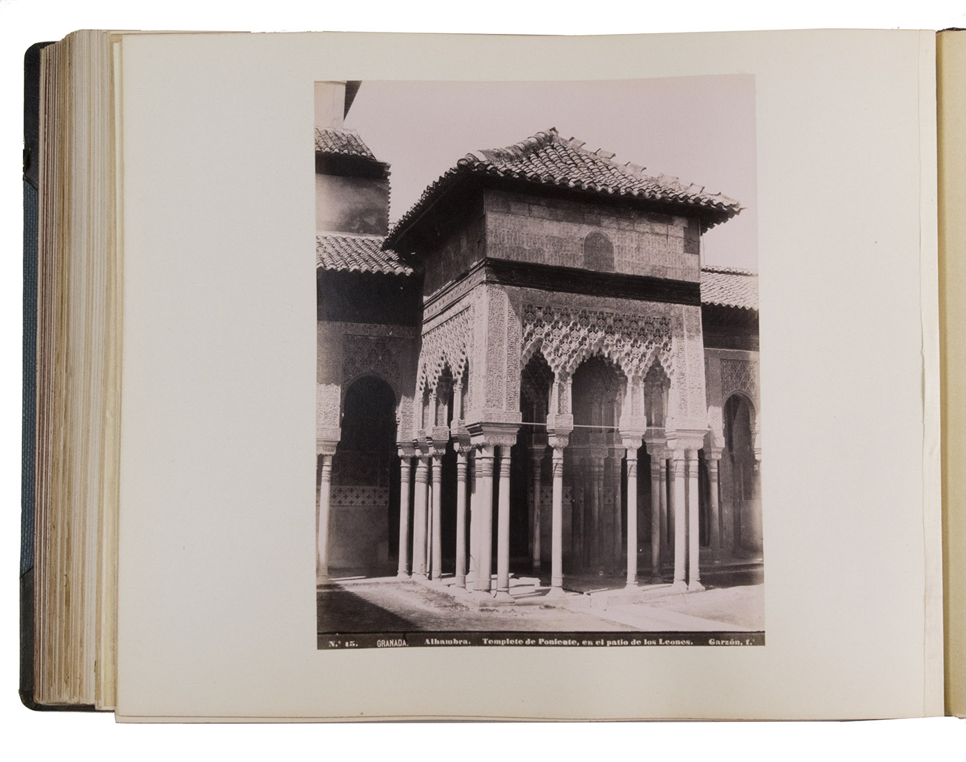 GARZN RODRGUEZ, Rafael. - [Photography - Spain]. Toledo, Crdoba, Granada.1890. Large oblong album (32 x 40 cm). 89 original photographs, mostly 20 x 26 cm.   Half blind-tooled greenish brown calf and grey/green net grained cloth over boards, with the title in gold on the front board, red edges and decorated endpapers.