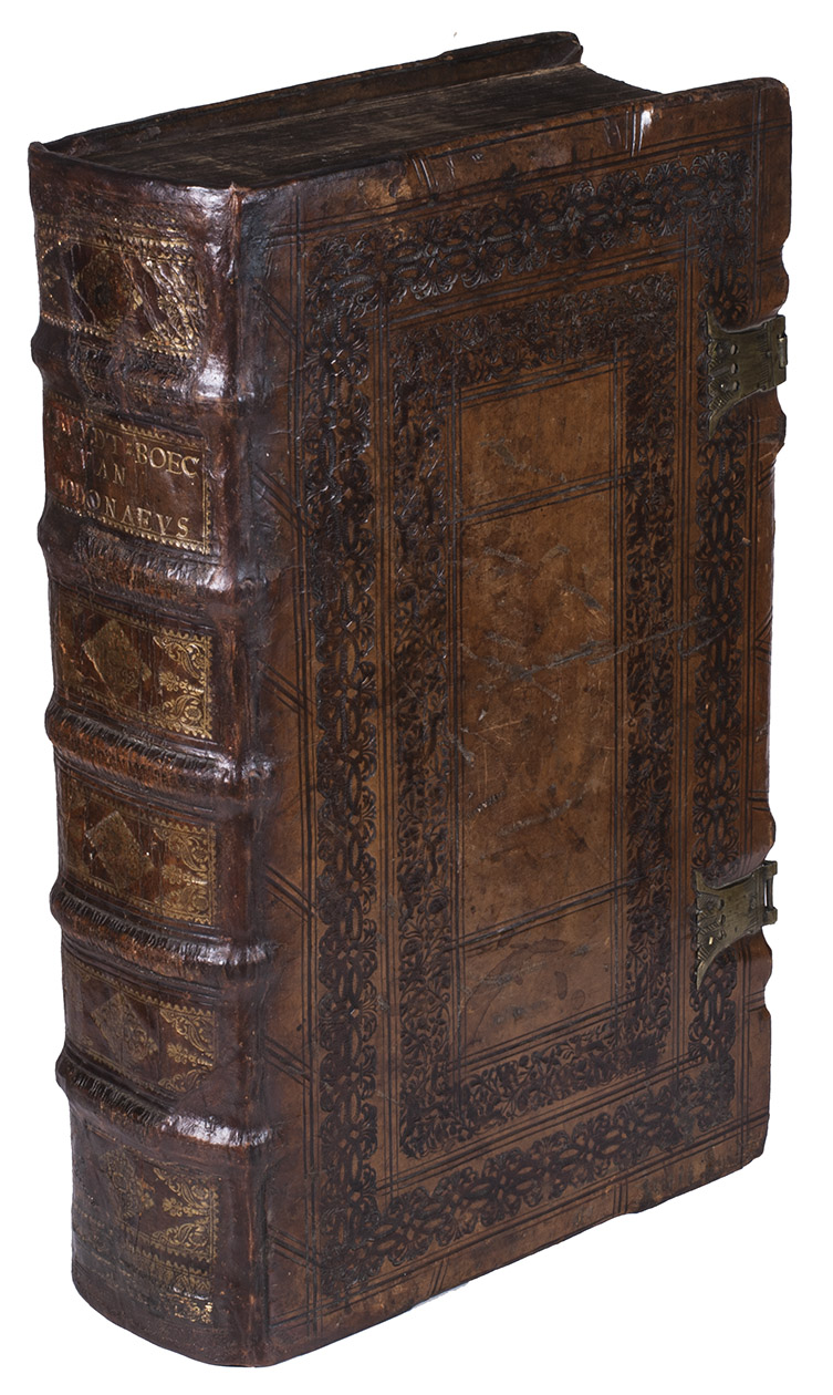 DODONAEUS (DODOENS), Rembertus. - Cruydt-Boeck ...Antwerp, Balthasar II Moretus in the Plantin printing office, 1644. Large folio (ca. 25 x 41 cm). With an integral, richly engraved title-page, with 1470 botanical woodcuts in the text, woodcut decorated initials, woodcut tailpiece with the Plantin compasses device at the end of the index and larger woodcut publishers device with the compasses and motto on the last, otherwise blank leaf. Set in textura types with extensive roman, italic and civilit.  Contemporary gold- and blind-tooled calf over boards, with brass catch- and anchor-plates and one brass clasp.