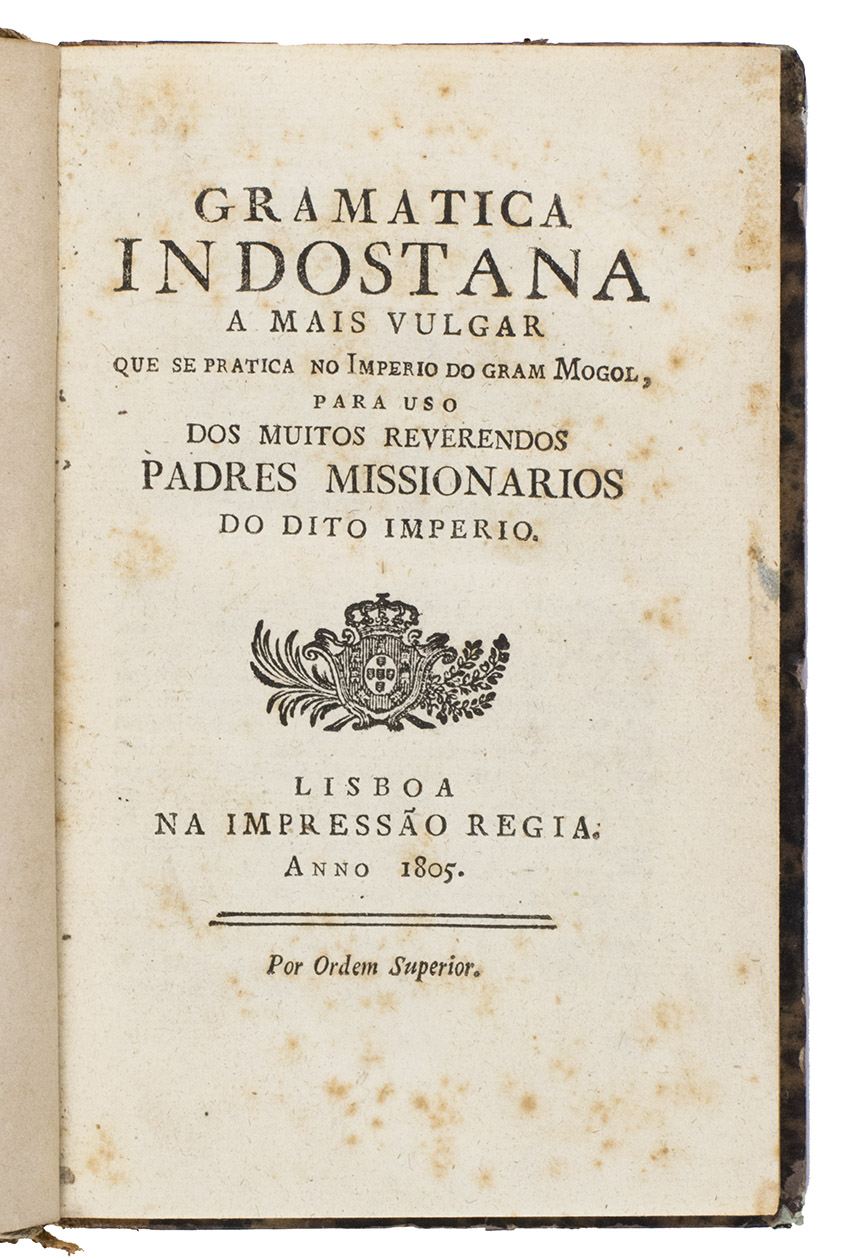[HINDUSTANI - GRAMMAR]. - Gramatica indostana a mais vulgar que se practica no imperio do gram Mogol, para uso dos muitos reverendos padres missionarios do dito imperio.Lisbon, Impresso Regia, 1805. Small 8vo (17.5 x 11.5 cm). With a woodcut vignette on the title page.   Mid-19th century half gold-tooled tanned sheepskin, marbled paper sides. With the title in gold on the spine, marbled endpapers.