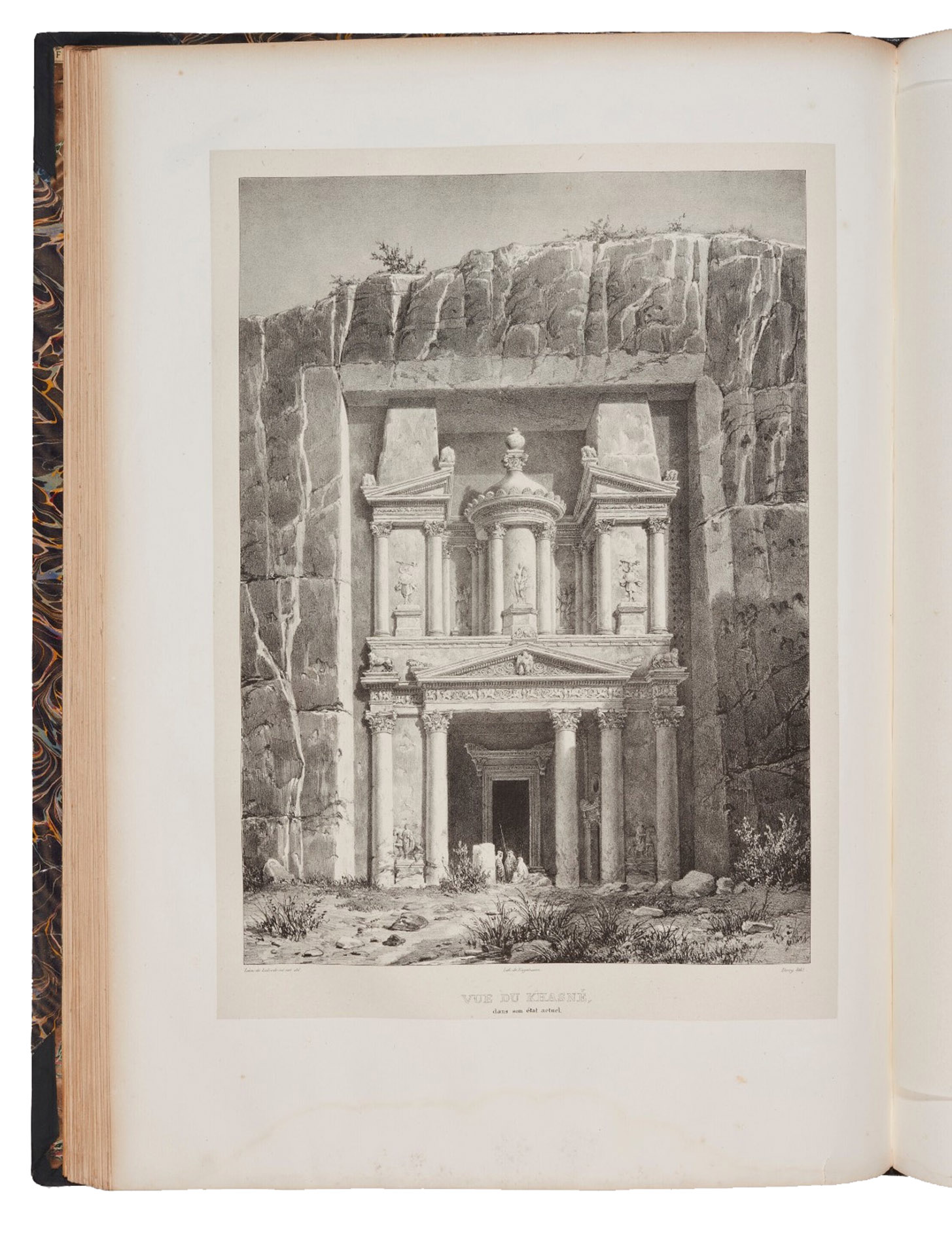 LABORDE, Lon [Emmanuel Simon Joseph] de. - Voyage de l'Arabie Ptre.Paris, Giard, 1830. Imperial folio (42 x 59.6 cm). With a large lithographed title vignette and the coat of arms of Wilhelm II on the dedication leaf. 69 lithographed plates, maps, and plans after Laborde and Linant de Bellefonds, mostly mounted on India paper (including 3 folding and 2 coloured). Simier binding in gold-tooled half green morocco and marbled paper over boards, elaborately gold-tooled spine (and stamped in gold: 