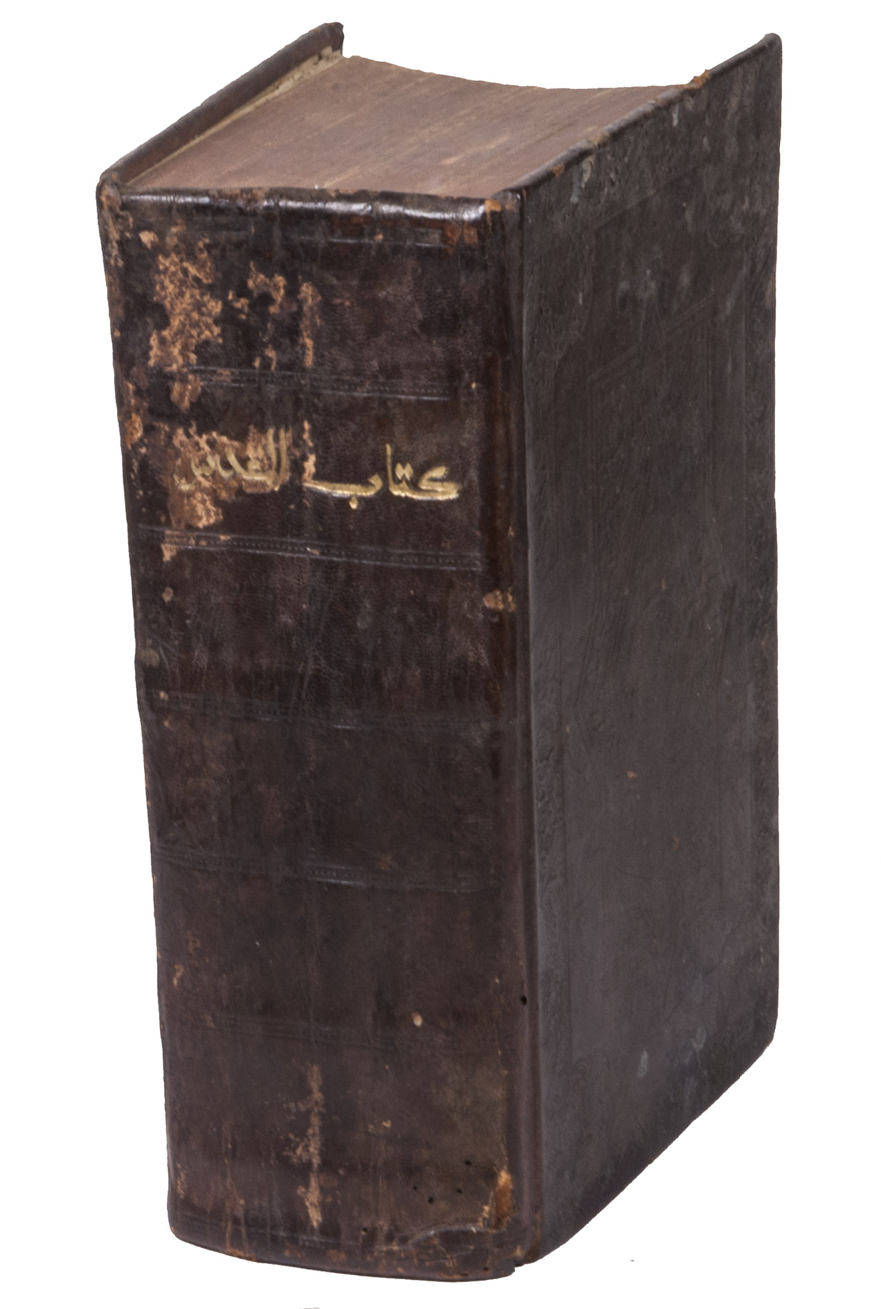[BIBLE - ARABIC - OLD AND NEW TESTAMENT]. - Kitab Al-Muqaddas al-Mushtamil 'ala Kutub al-'Ahd al-'Atiq wal 'Ahd al-Jadid [The Holy Book, included the books of the Old Testament found in the original Hebrew of our Lord Jesus Christ and also the Book of the New Testament].London, William Watts, 1855. 8vo (22 x 14 cm). Original elaborately embossed brown calf with the title lettered in gold on the spine, red edges.
