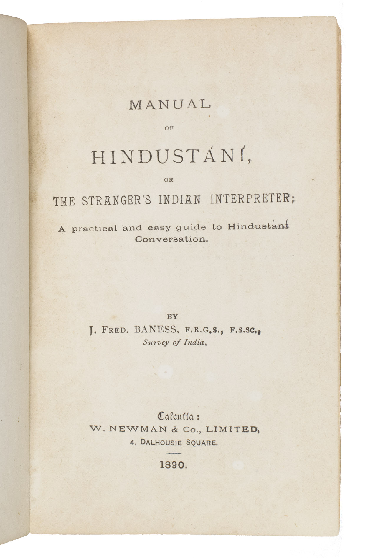 BANESS, Joshua Frederick. - Manual of Hindustn or the stranger's Indian interpreter; A practical and easy guide to Hindustn conversation.Calcutta, W. Newman & Co., 1890. 14 x 8,5 cm. With a woodcut tailpiece at the end of the work. Contemporary red pebble-grain cloth, with the title lettered in gold on the front board.