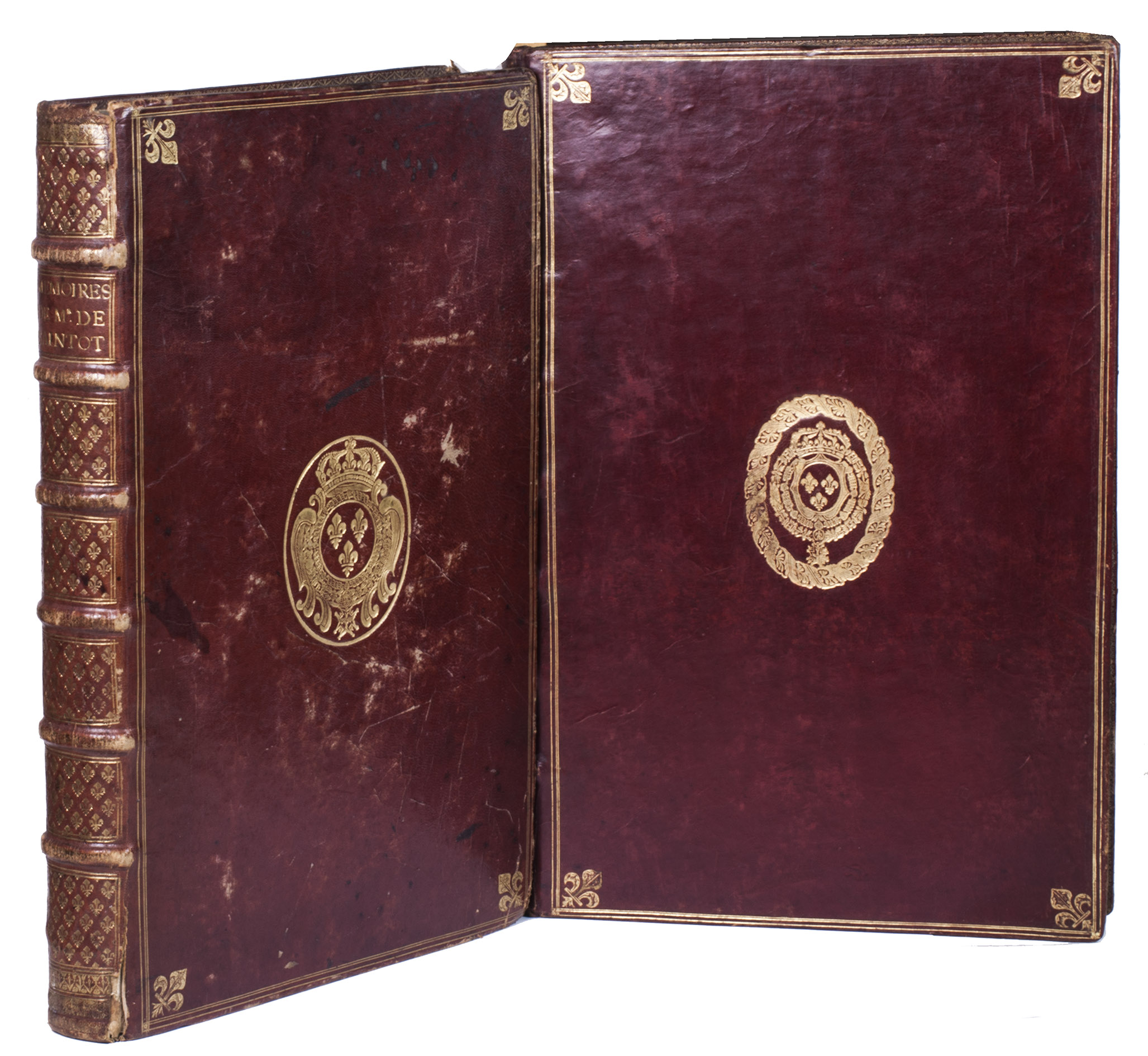 [SAINCTOT, Nicolas II de]. - [Memoires de Mr. de Sainctot].[Paris?, ca. 1710]. 2 works, with the first in 2 parts, in 2 volumes. Folio (44 x 30 cm). With 3 drawings of layouts and seating plans of the king's audience room, and 24 copper-engravings of ambassadors and court scenes.  With: (2) [AVICE, Henry]. La pompeuse et magnifique ceremonie du sacre du roy Louis XIV.Paris, Imprimerie d'Edme Martin, 1655.Contemporary gold-tooled red morocco, with the French royal coat-of-arms on the front and back, fleurs-de-lis in the corners and on the spine, the title lettered in gold on the spine, gold-tooled board edges and turn-ins, gilt and marbled edges, marbled endpapers.
