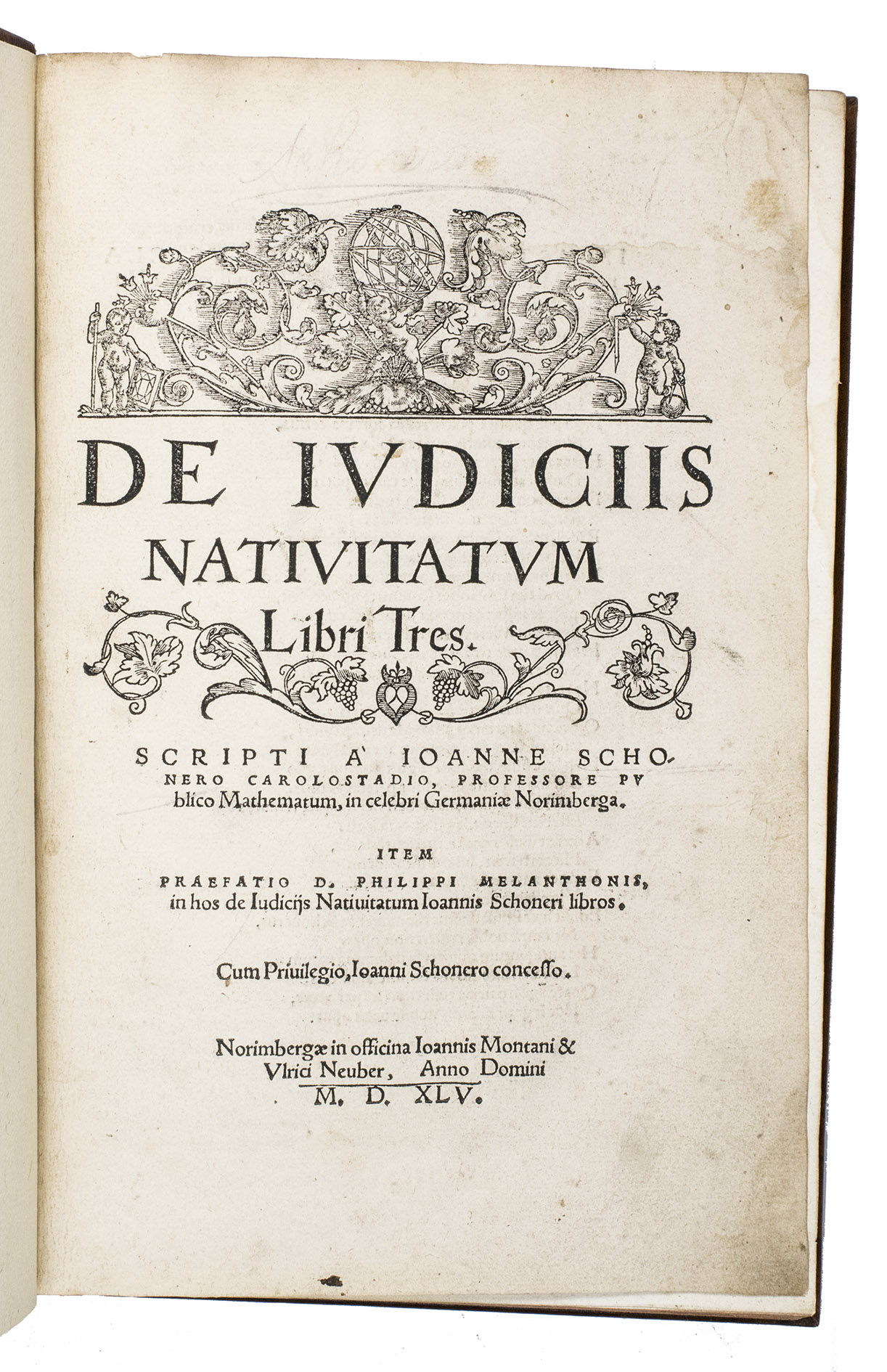 SCHNER, Johannes. - De iudiciis nativitatum libri tres ... Item praefatio D. Philippi Melanthonis ...Nuremberg, Johann vom Berg and Ulrich Neuber, 1545. Folio (ca. 29 x 19.5 cm). With a woodcut headpiece and vignette on the title-page, a large woodcut printer's device with the Latin motto Hic est filius meus dilectus: in quo mihi bene complacitu est on the verso of the last leaf. Further with numerous envelope horoscope diagrams, letterpress tables (incorporating the signs of the zodiac), and decorated woodcut initials in the text. Modern gold-tooled sprinkled leather.