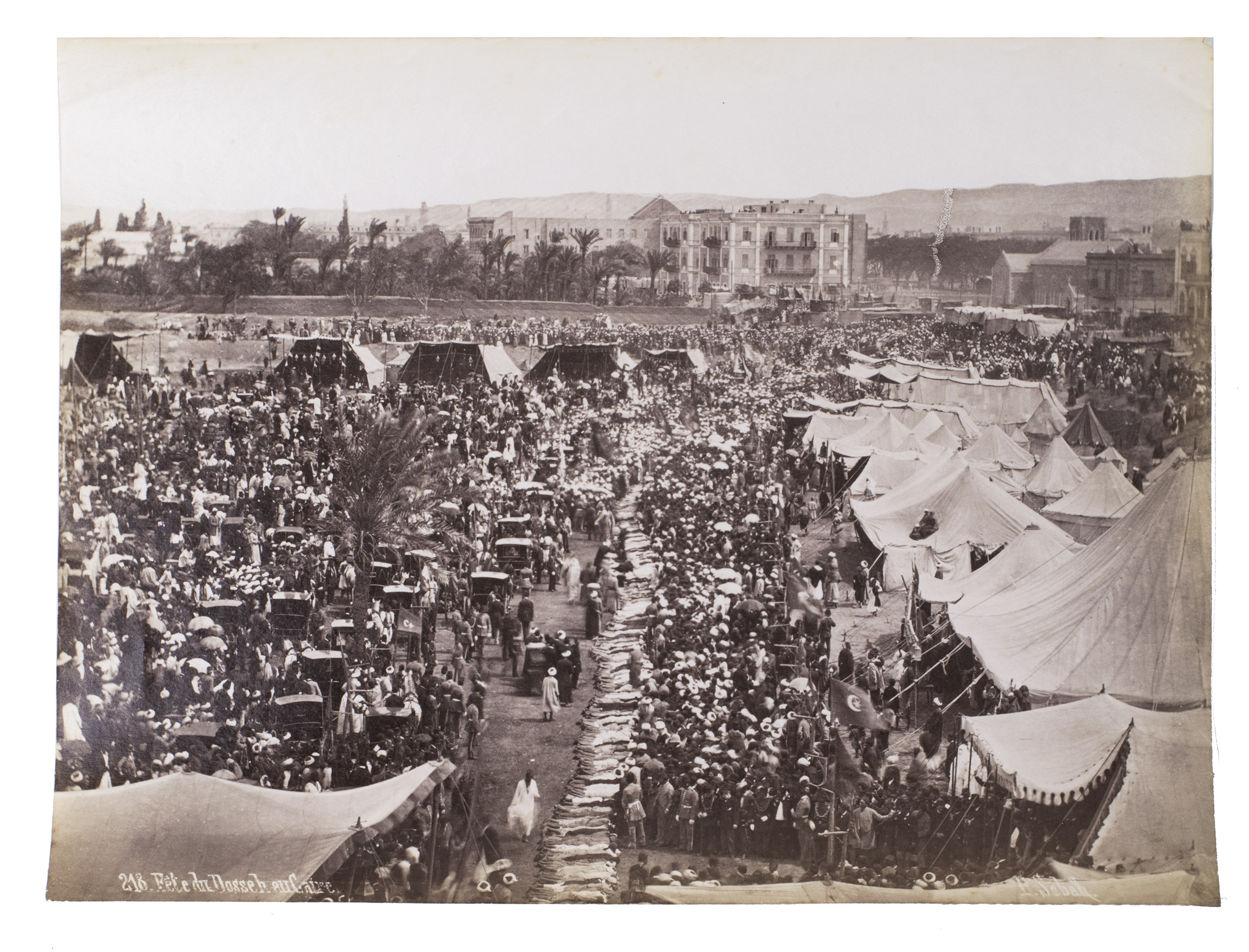 SBAH, Pascal (photographer). - [Festivities in Cairo].[Late 19th century]. Three albumen prints (each ca. 19.5 x 26 cm). Housed in a clear plastic sleeve.