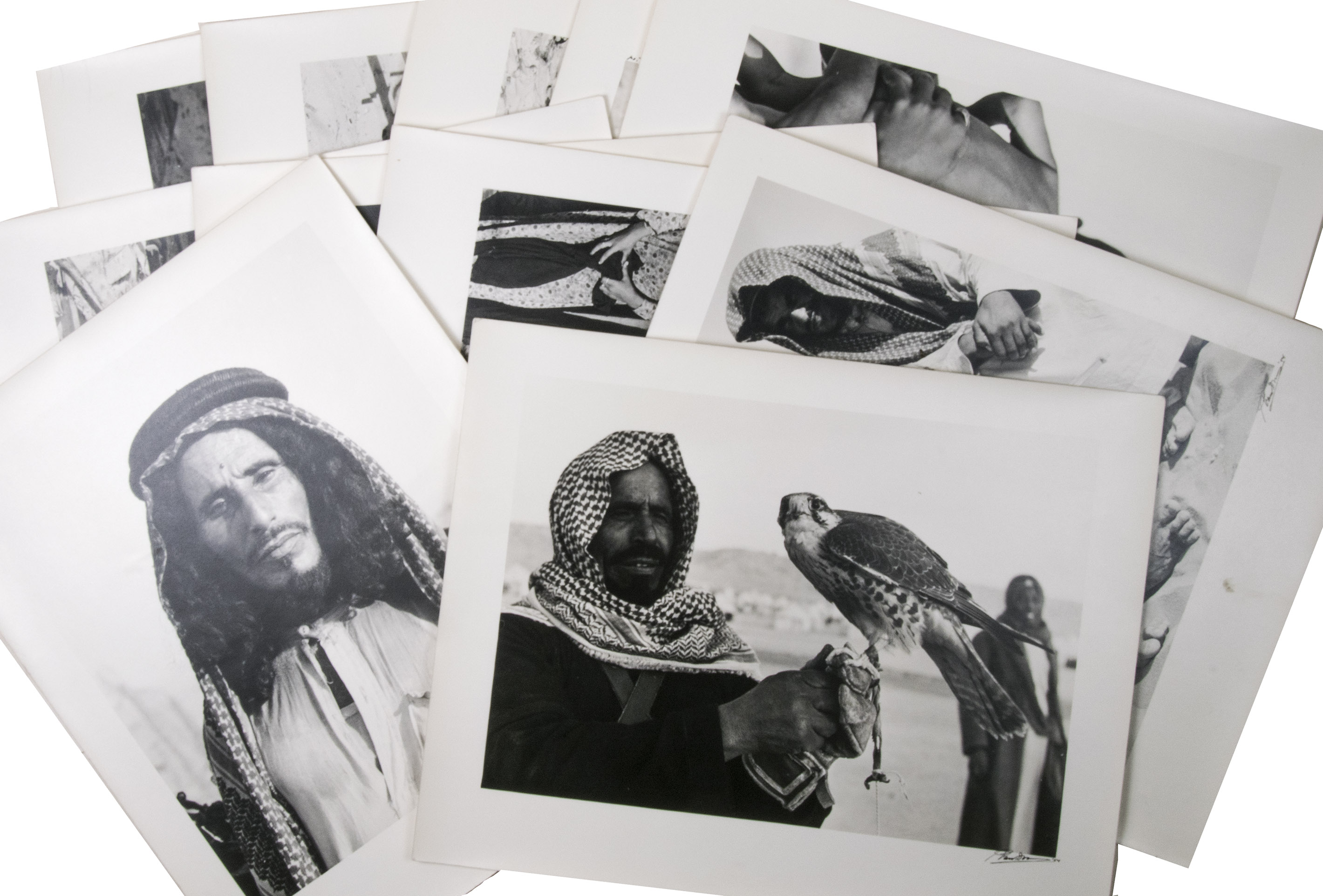 [PHOTOGRAPHY - SAUDI ARABIA - KUWAIT]. - [Collection of twelve photographs, capturing daily life in Saudi Arabia in the 1950s].[Saudi Arabia or Kuwait], 1954. Ca. 28.8 x 22.8 cm (sheet size: ca. 35.3 x 27.8 cm). Twelve photographic prints, all signed and dated. Housed in clear plastic folder.