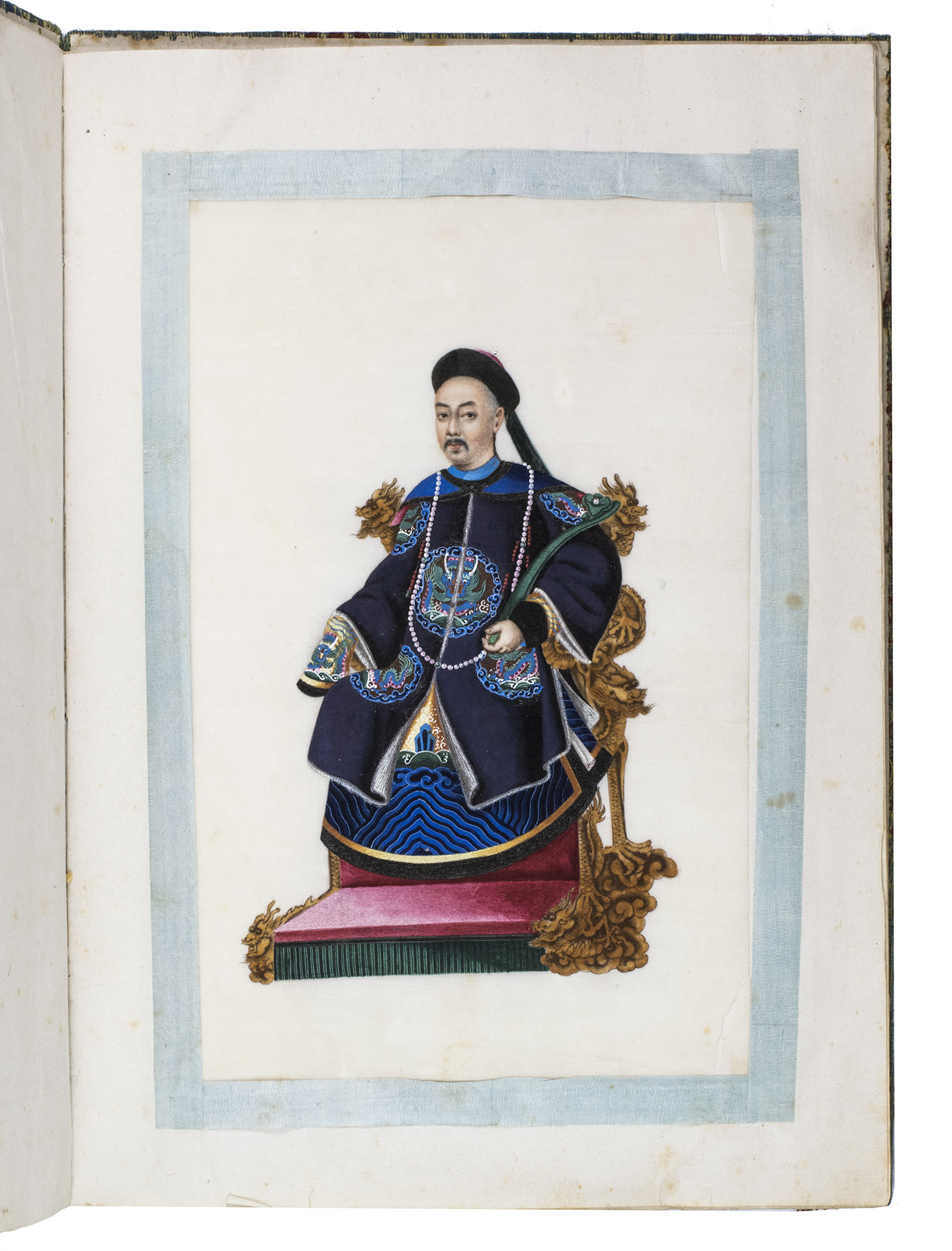 [SUNQUA (attributed)]. - [Album with twelve Chinese pith paintings of court officials].[Guangzhou (Canton), before 1850]. Folio (ca. 34.5 x 24.5 cm). Gouache and gold on pith paper (ca. 26.5 x 17.5 cm), each drawing is mounted by its corners in an album of mulberry-bark(?) paper (ca. 34 x 24 cm) and framed with a light blue silk ribbon. Contemporary green silk brocade with a floral pattern, pink closing ties.