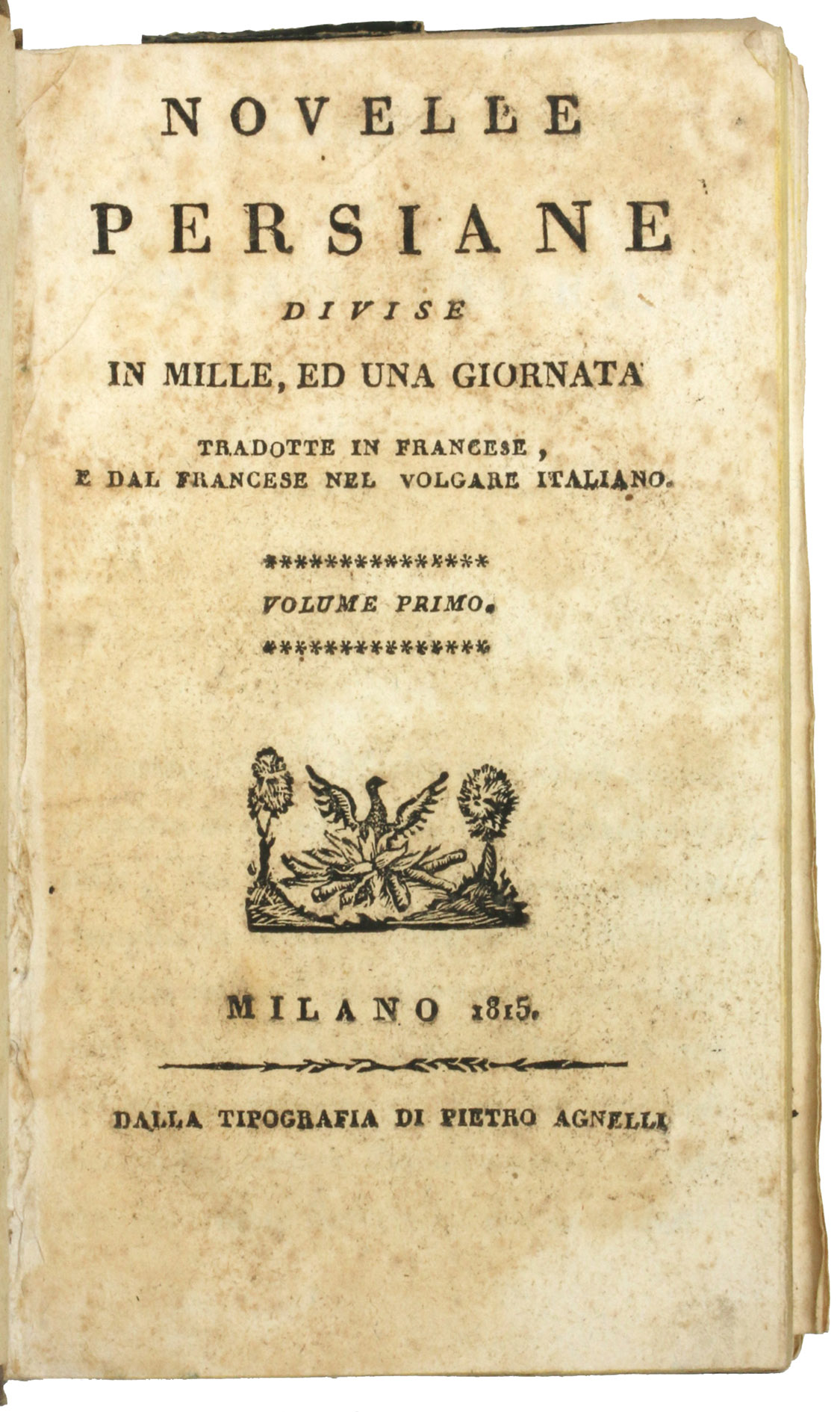 [THOUSAND AND ONE DAYS - ITALIAN]. - Novelle persiane divise in mille, ed una giornata, tradotte in francese e dal francese nel volgare italiano. Tomo primo [-quinto]. Milan, Pietro Agnelli, 1815. 5 volumes bound as 2. 12mo. With a small woodcut vignette on each title page.  Contemporary half beige cloth, marbled paper sides, with the title lettered in gold on the spine.