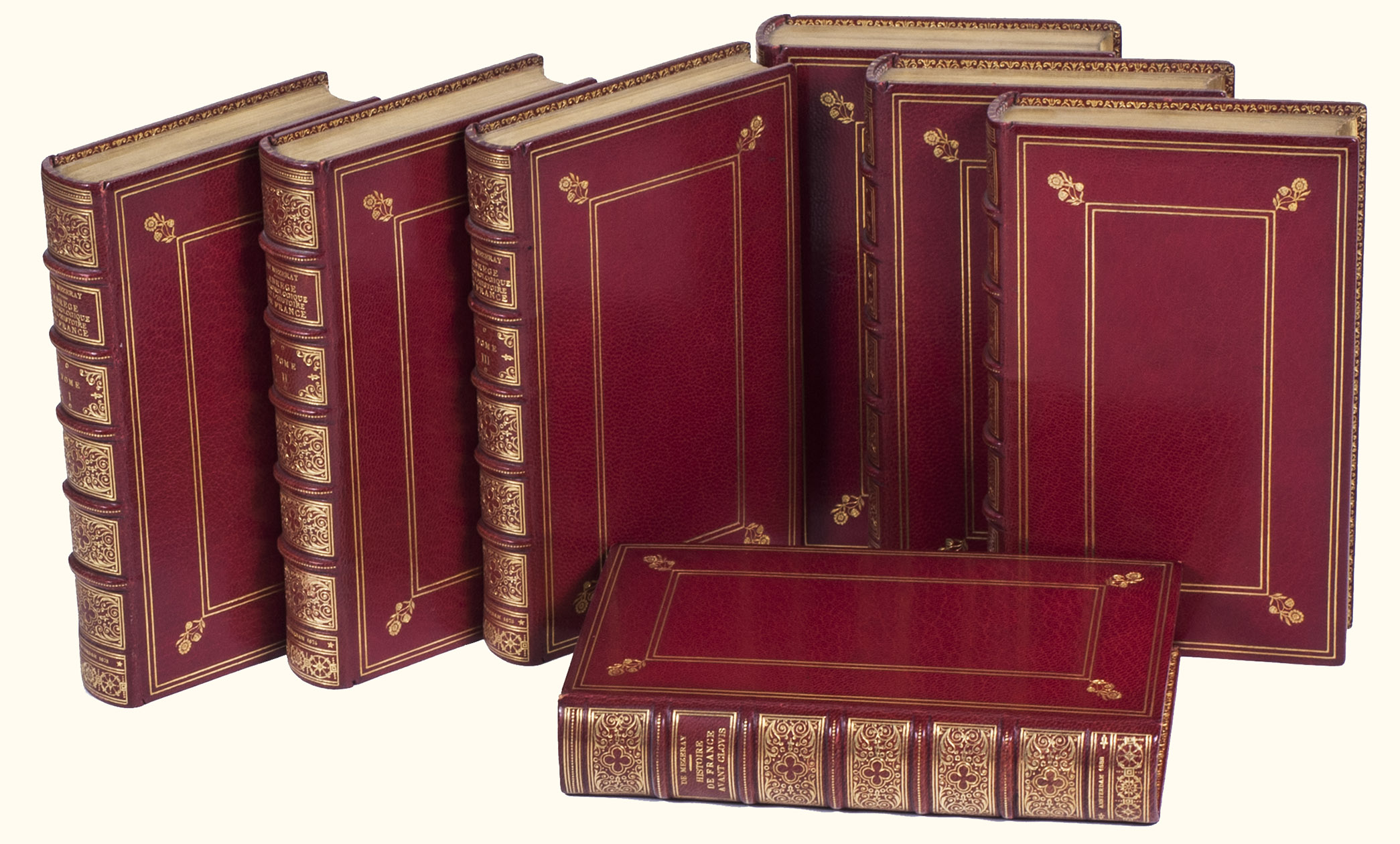 MEZERAY, Francois Eudes de. - Abregé chronologique de l'histoire de France. ... Divisé en six tomes.Amsterdam, Abraham Wolfgang, 1673-1674. With: (2) MEZERAY, Francois Eudes de. Histoire de France avant Clovis. Amsterdam, Abraham Wolfgang, 1688.2 works in 7 volumes. 12mo. Ad 1 with woodcut publisher's device on each of the 6 title-pages, engraved frontispiece-title in the style of Romeyn de Hooghe and full-page engraved portrait of Louis XIV by A. Zylevelt in volume 1, 61 engraved portraits of French rulers in text, woodcut head- and tailpieces, woodcut initials. Ad 2: with engraved frontispiece-title in the style of Romeyn de Hooghe, title-page with woodcut publisher's device, woodcut head- and tailpieces, woodcut initials. Uniform polished, crushed red morocco, gold-tooled boards, spines and wide turn-ins, fillets on board edges, edges gilt over marbling, marbled endpapers. Each volume signed and dated 1913 on the turn-in by the leading Brussels bookbinder Charles DE SAMBLANX (1855-1943).