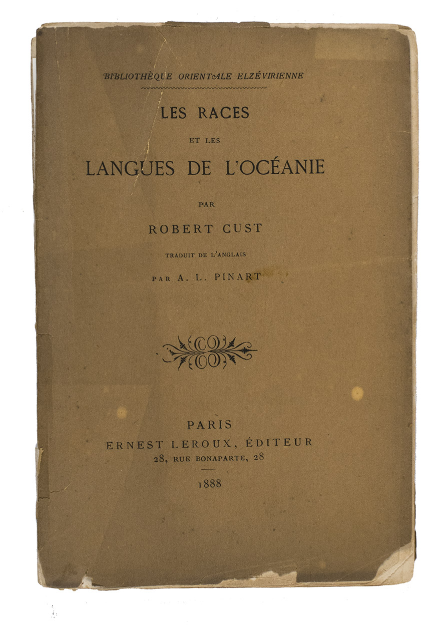 CUST, Robert Needham. - Les races et les langues de l'Ocanie  traduit de l'anglais par A.L. Pinart.Paris, Ernest Leroux (back of half-title: Le Puy, printing office of Marchessou fils), 1888. 12mo (17 x 11.5 cm). With a folding chromolithographed language map of Oceania, 1 headpiece in 17th-century style. Original publisher's printed paper wrappers.