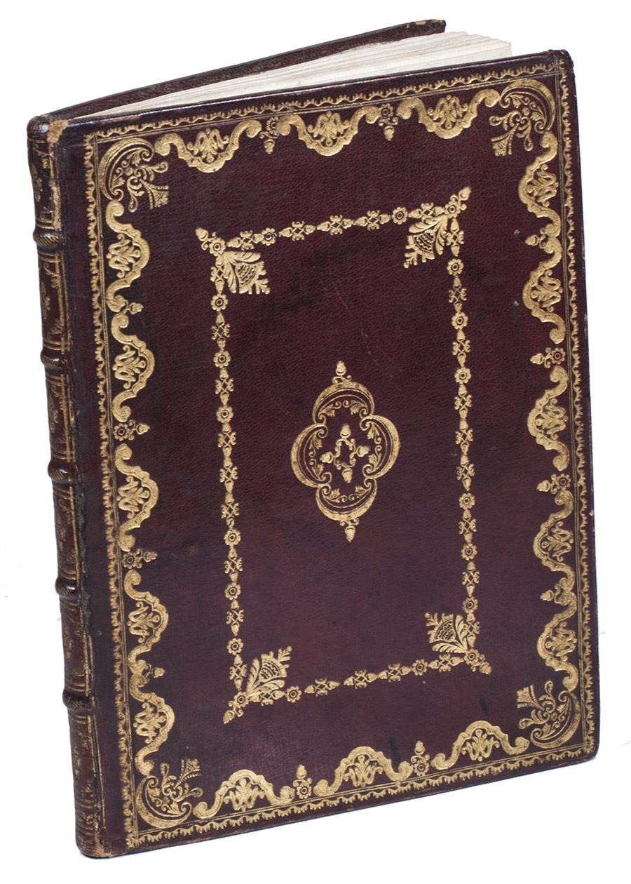 GOMES DA SILVA, Alberto Jos. - Regras de acompanhar para cravo, ou orga, e ainde tambem para qualquer outro instrumento de vozes, reduzidas a breve methodo, e fcil percepa.Lisbon, Francisco Lus Ameno, 1758. 4to (21 x 15 cm). With 12 pages of engraved music printed from 12 copper plates on both sides of 6 inserted leaves (mostly polyphonic music with 4 double staves - G and F clef - per page). Further with a full-page engraved dial showing the 12 intervals in all major and minor keys, including diminished and augmented intervals (lacking the inner rotating dial with the twelve notes: photocopy supplied), a woodcut ornament on the title-page, 2 woodcut decorated initials (from 2 different series) and 2 woodcut head pieces. Contemporary, richly gold-tooled red goatskin morocco.