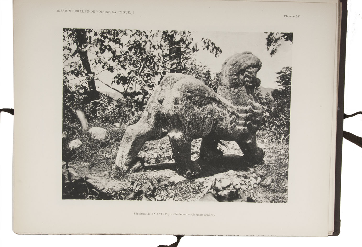 SEGALEN, Victor, Gilbert de VOISINS and Jean LARTIGUE. - Mission archologique en Chine (1914). L'art funraire a l'poque des Han.Paris, Paul Geuthner, 1923-1935. 3 volumes (1 text and 2 atlases). 4to (text) and 38.5 x 28 cm (atlases). With 121 illustrations in text and 144 collotype plates in the atlas. Text volume in original printed paper wrappers. Atlas in original half cloth, printed paper sides.