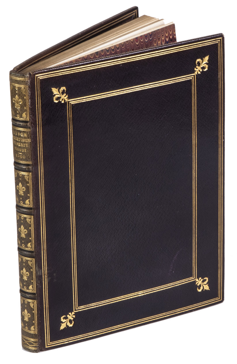 ALBERTUS MAGNUS (pseudo). - Liber secretorum ... De virtutibus herbarum: & animalium quorundam. Eiusdemq[ue] liber De mirabilibus mundi: & etiam de quibusdam effectibus causatis a quibusdam animalibus &c.(Colophon: Venice, Johan Baptist Sessa, 12 February 1502). Small 4to (21 x 15.5 cm). With a large woodcut portrait of the author at his desk. Gold-tooled maroon morocco (ca. 1870/90?) for James Carnegie, 9th Earl of Southesk (1827-1905), gilt edges.