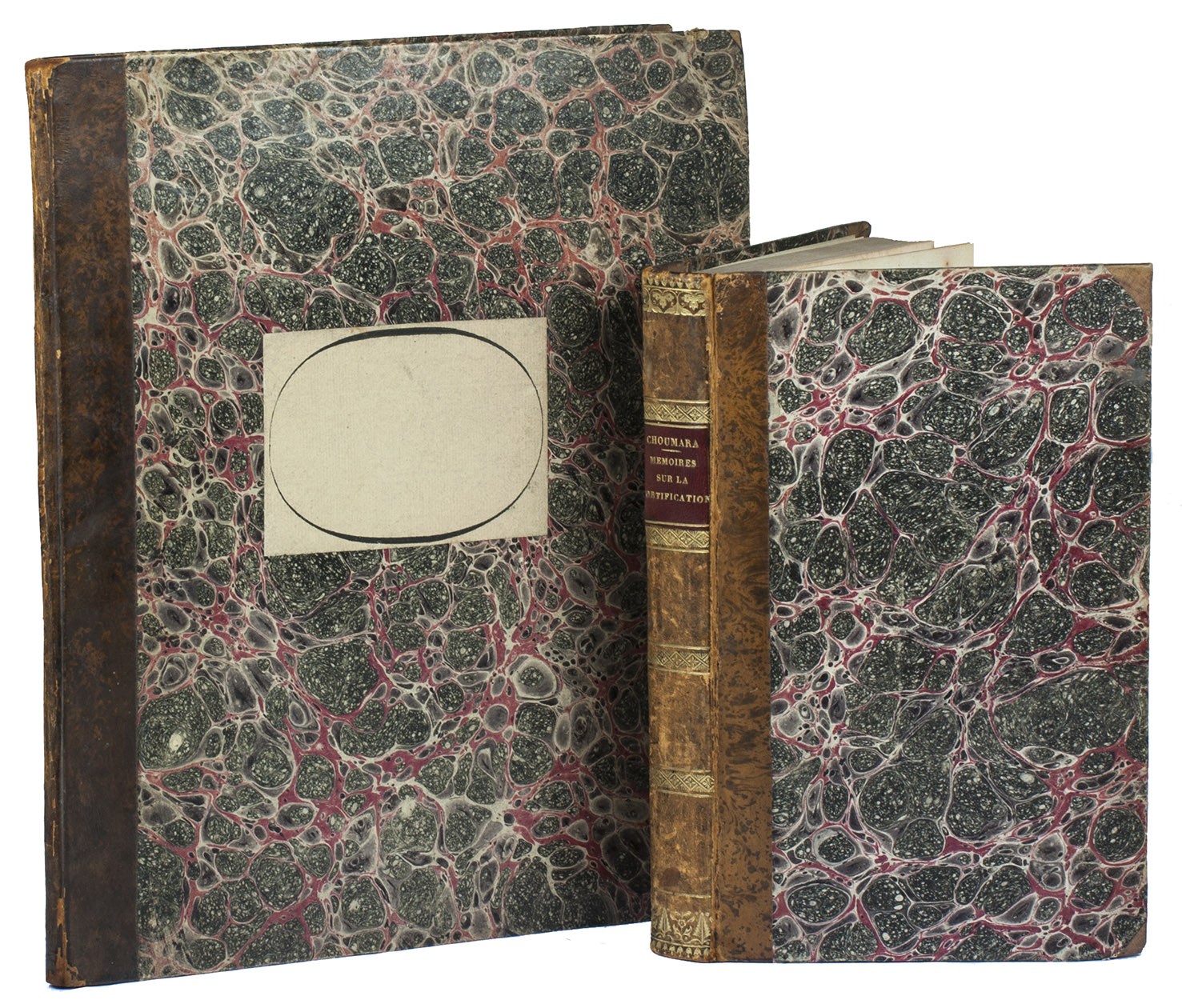 CHOUMARA, Pierre-Marie Thodore. - Mmoires sur la fortification, ou examen raisonn... avec atlas.Paris, Anselin (back of half-title: printed by A. Henry), 1827. 2 volumes (8vo text and 4to atlas). With 3 very large folding lithographed plates (ca. 54.5 x 77 cm) in atlas volume. Contemporary marbled half calf, gold-tooled spine.