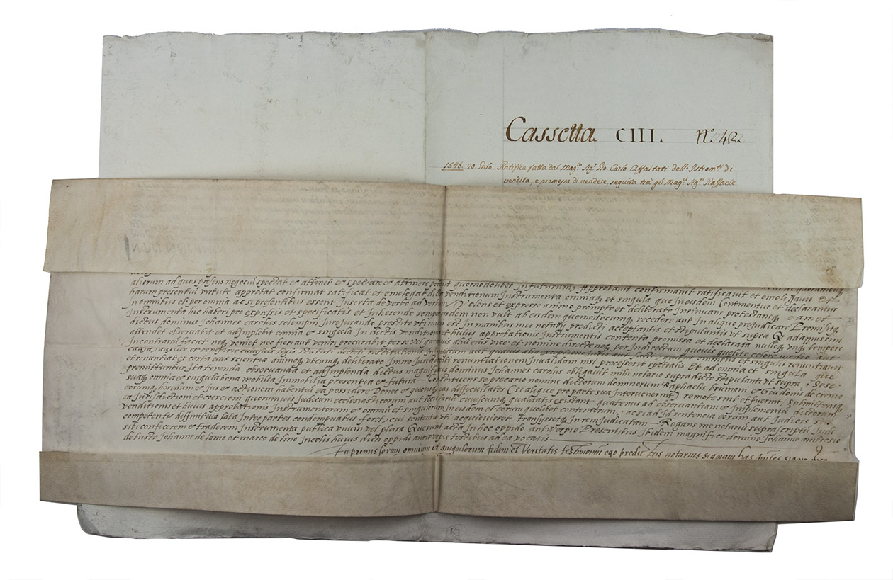 [MANUSCRIPT - NOTARIAL DECLARATION]. AFFAITATI, Giovan Carlo (Johannes Carolus de AFFAYTADI). - Ratificatio facta p[er] m[agnifi]cu[m] d[ominum] Jo[hannes] Carolu[s] de Affaytalis, in favorem m[agnifi]ci et r[everen]di d[omino]. Guidi d[e] Crema et Rafaelis Krumani p[e]r Castro S[anc]ti Laurentii et terris.Antwerp, 20 January 1546. Manuscript notarial document in Latin, written in a Latin hand on one side of a single piece of sheepskin parchment (31 x 54.5 cm), opening with a large capital and closing with the notary's decorative signature, with the title and 