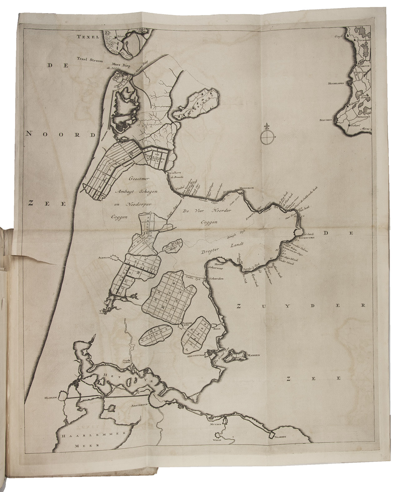 LAKENMAN, Seger. - Ontwerp van een onkostbaar en zeker middel, om de Westvriesche zeedyken... te stellen buiten eenig gevaar van doorbrake...Amsterdam, heirs of Johannes Ratelband and company and Hendrik de Leth, 1733. Folio. With 2 folding engraved plates, including a map of North-Holland. Contemporary marbled paper wrappers, preserved in a blue cloth chemise.