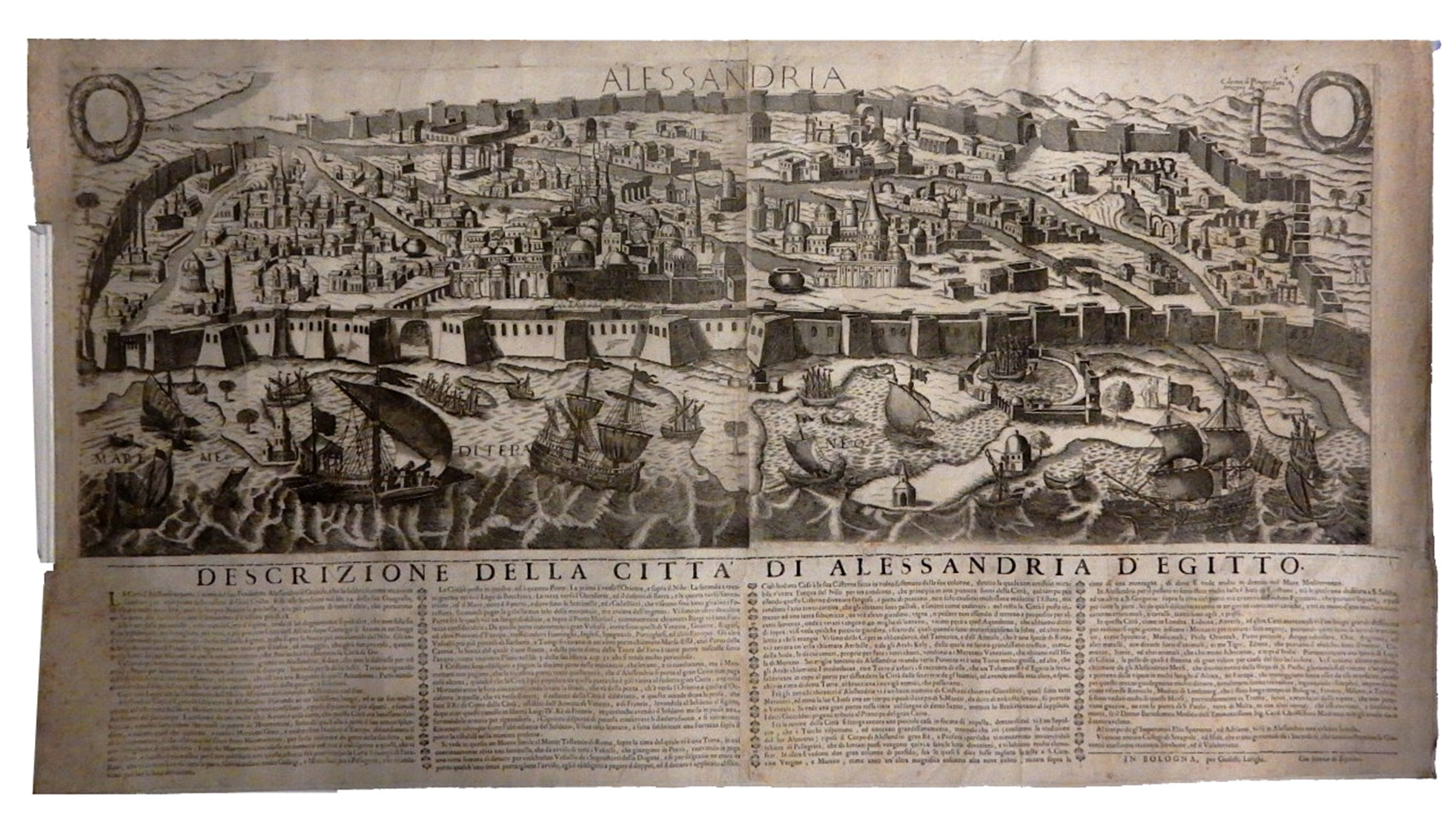 LONGHI, Gioseffo. - Alessandria.Bologna, Longhi, [1670s]. 106.5 x 58 cm. Cloth-backed engraved view on 2 sheets joined, letterpress text pasted below (4 columns in Italian: 