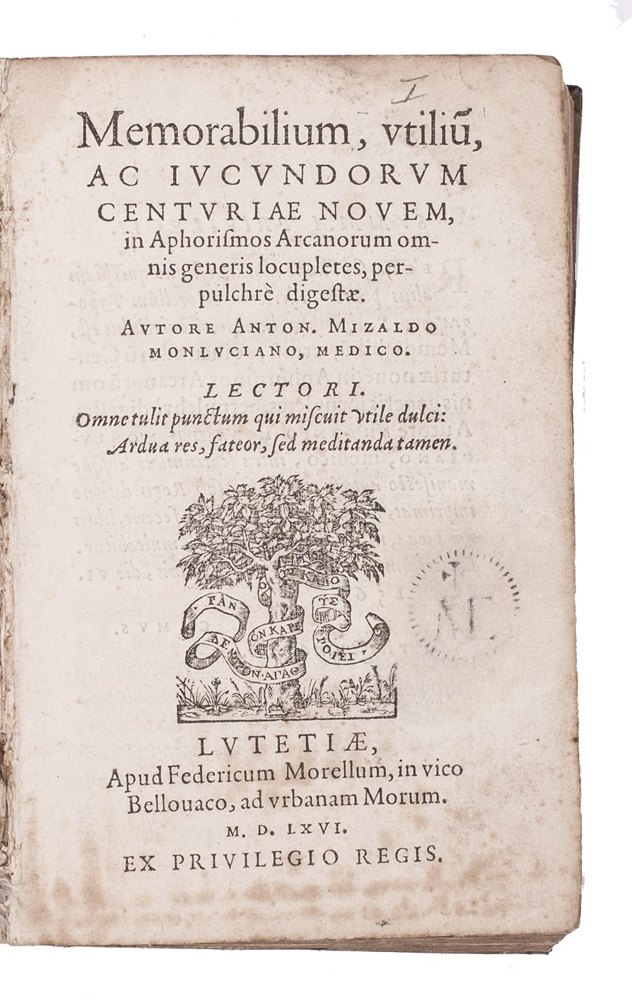 MIZAULD, Antoine. - Memorabilium, utiliu[m], ac jucundorum centuriae novem, in aphorismos arcanorum omnis generis locupletes, perpulchr digestae. Paris, Fdric Morel, 1566. 8vo. With Morel's woodcut tree device on the title-page, 2 woodcut headpieces and 7 woodcut decorated initials (plus 3 repeats), the headpieces and initials in an unusually delicate design, finely executed. Set in italic types with the preliminaries in roman, and incidental Greek. 17th-century limp sheepskin parchment.