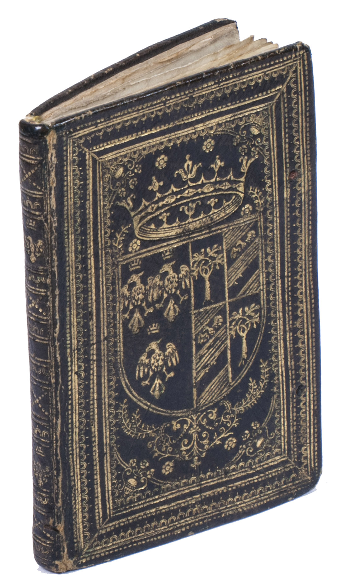 MECHELEN, Hans van. - Perill[ust]ri. ac reverend[issimo]. d[omi]no D. Michaeli Ophovio ex. ord. praedic. Episcopo Buscoducensi S. Dominicum Gusmannum eiusdem ordinis fundatorem D.D.[Antwerp], Hans van Mechelen, [ca. 1629]. 24mo (11 x 7 x 0.6 cm). Wholly engraved print series printed on vellum, comprising an engraved title page and 12 engraved scenes from the life of Saint Dominic. The title page cartouche and all 12 scenes coloured by a 17th-century hand and highlighted in gold. 17th-century richly gold-tooled armorial black morocco, each board with a Lante della Rovere coat of arms, gold-tooled board edges.
