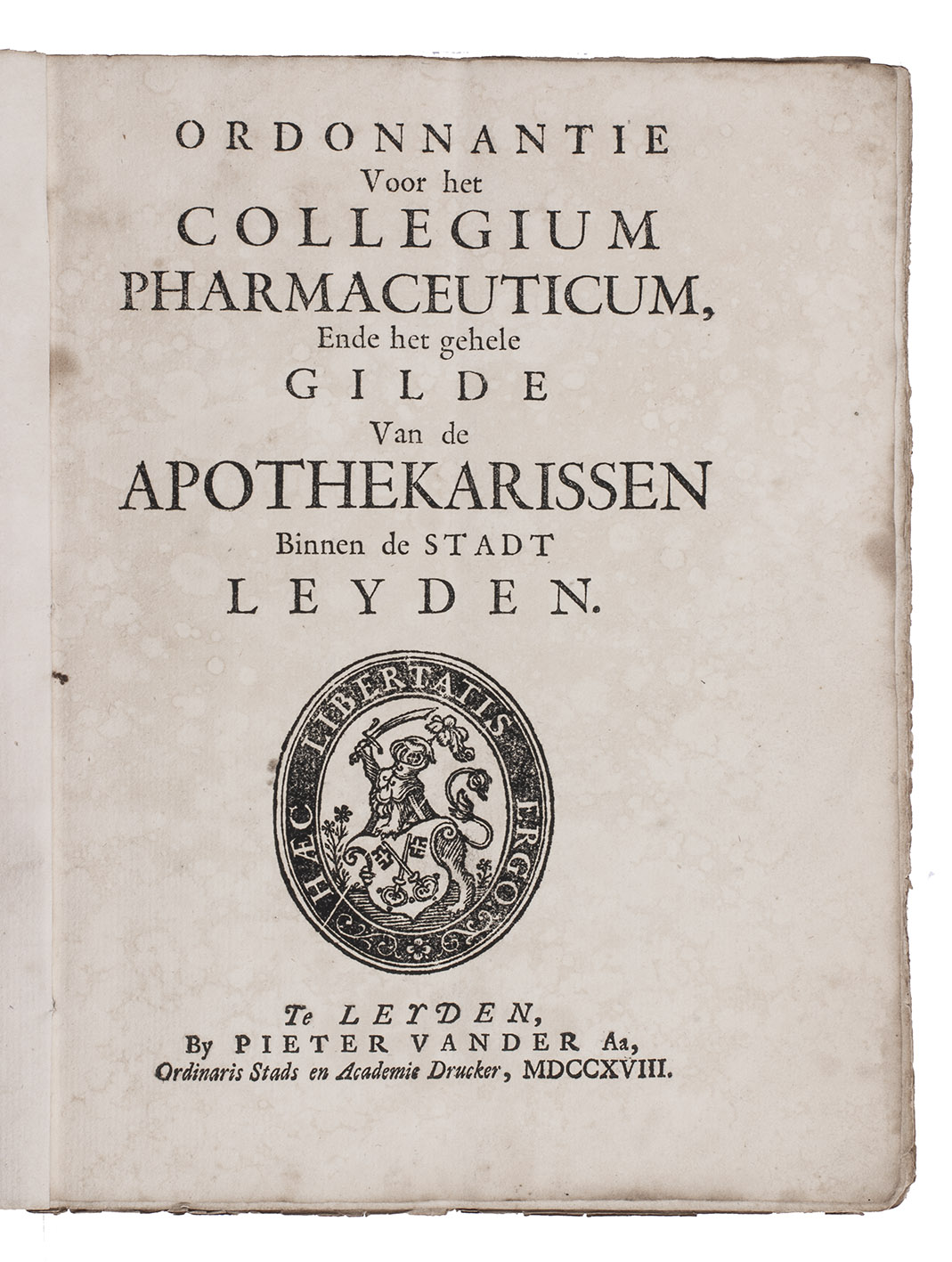 [ORDINANCE - PHARMACY]. - Ordonnantie voor het Collegium Pharmaceuticum, ende het gehele gilde van de apothekarissen binnen de stadt Leyden.Leiden, Pieter van der Aa, 1718. 4to. With the woodcut coat of arms of Leiden on the title-page. Contemporary marbled paper wrappers.