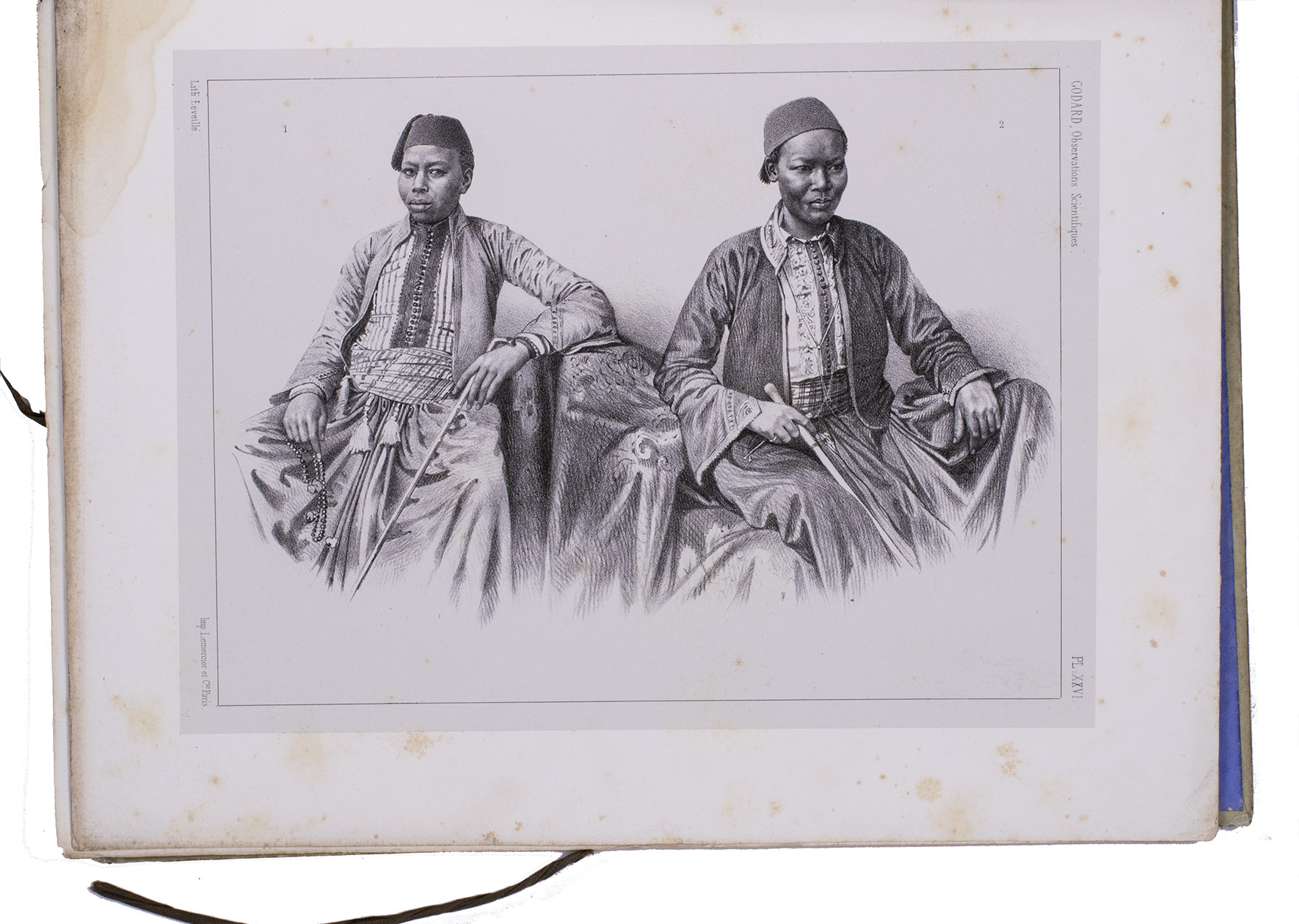GODARD, Ernest. - gypte et Palestine observations mdicales et scientifiques.Paris, Victor Masson et fils (back of half-title: printed by Simon Raon et Comp.), 1867. 2 volumes: 8vo (text) and 4to (plates). With an engraved author's portrait by Jean Charles Le Vasseur and 27 numbered lithographed plates, each preceded by a leaf with a short letterpress caption. Later black half goatskin, with the original boards (text) and the plates loosely inserted in original publisher's portfolio, printed boards, rebacked with black cloth.