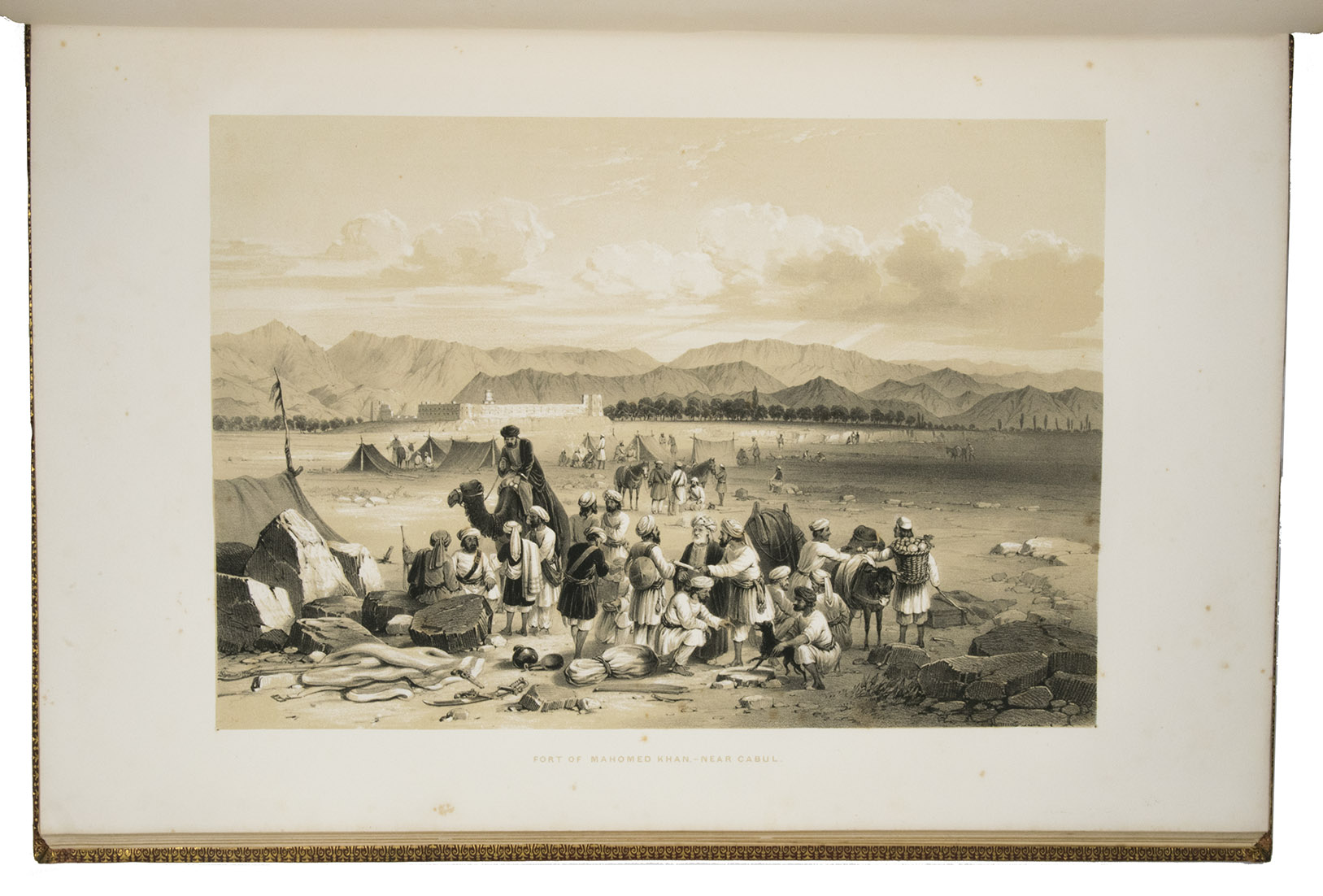 SALE, Sir Robert H. (and others). - The defence of Jellalabad, ... drawn on stone by W.L. Walton.London, Joseph Hogarth, Henry Graves & Co., and sold by Hullmandel & Walton, [1845/46]. 1mo (full-sheet leaves) (54 x 37 cm). With a lithographed frontispiece portrait of Sale by Thomas Fairl and after a painting by Scarlet Davis, a lithographed illustrated title-page, a lithographed dedication to Queen Victoria (reproducing Sales hand-written and signed dedication), a double-page Plan of Jellalabad (51.5 x 60 cm, lithographed by S. Leith in Edinburgh) and 34 tinted lithographic views of the city and its fortifications (in landscape format) on 22 leaves. Gold-tooled red goatskin morocco, richly gold-tooled turn-ins, gold-tooled board edges, yellow endpapers, gilt edges.