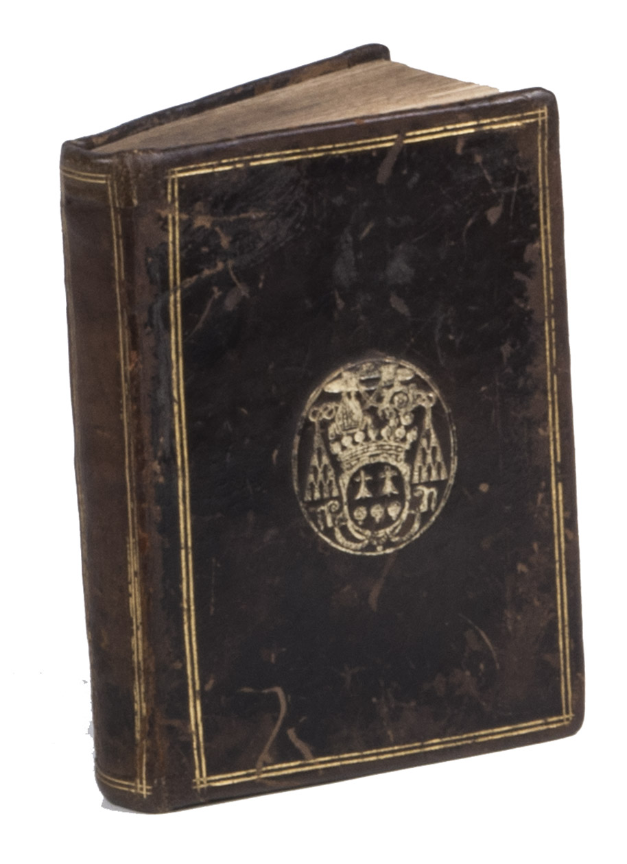 [BIBLE - PSALMBOOK]. PSALTERION. - Prophetou kai Basileoos tou David [in Greek type] - Davidis Regis ac Prophetae Psalmorum Liber. Ad exemplar Complutense.Antwerp, Christopher Plantin, 1584. 16mo (11,8 x 8 cm). With woodcut printer's device on the title-page, text is partially printed in Greek. Late seventeenth-century dark brown calf, with gold-stamped coat of arms of Pierre-Daniel Huet on both covers and gold-tooled dubbel-lined borders on covers and spine, (remnants of) red speckled edges.